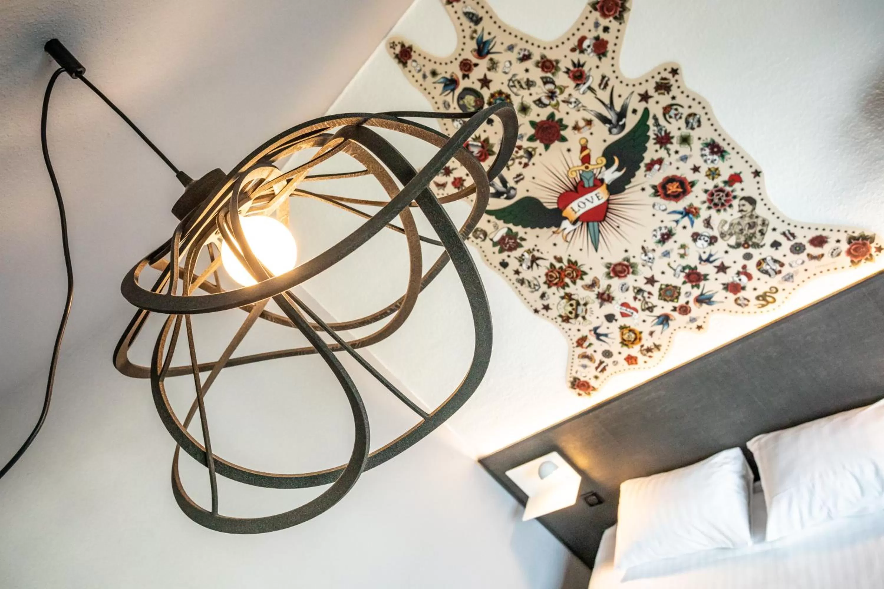 Decorative detail, Bed in Hôtel The Originals City Le Berry - proche centre-ville - Gare - parking - recharge véhicule