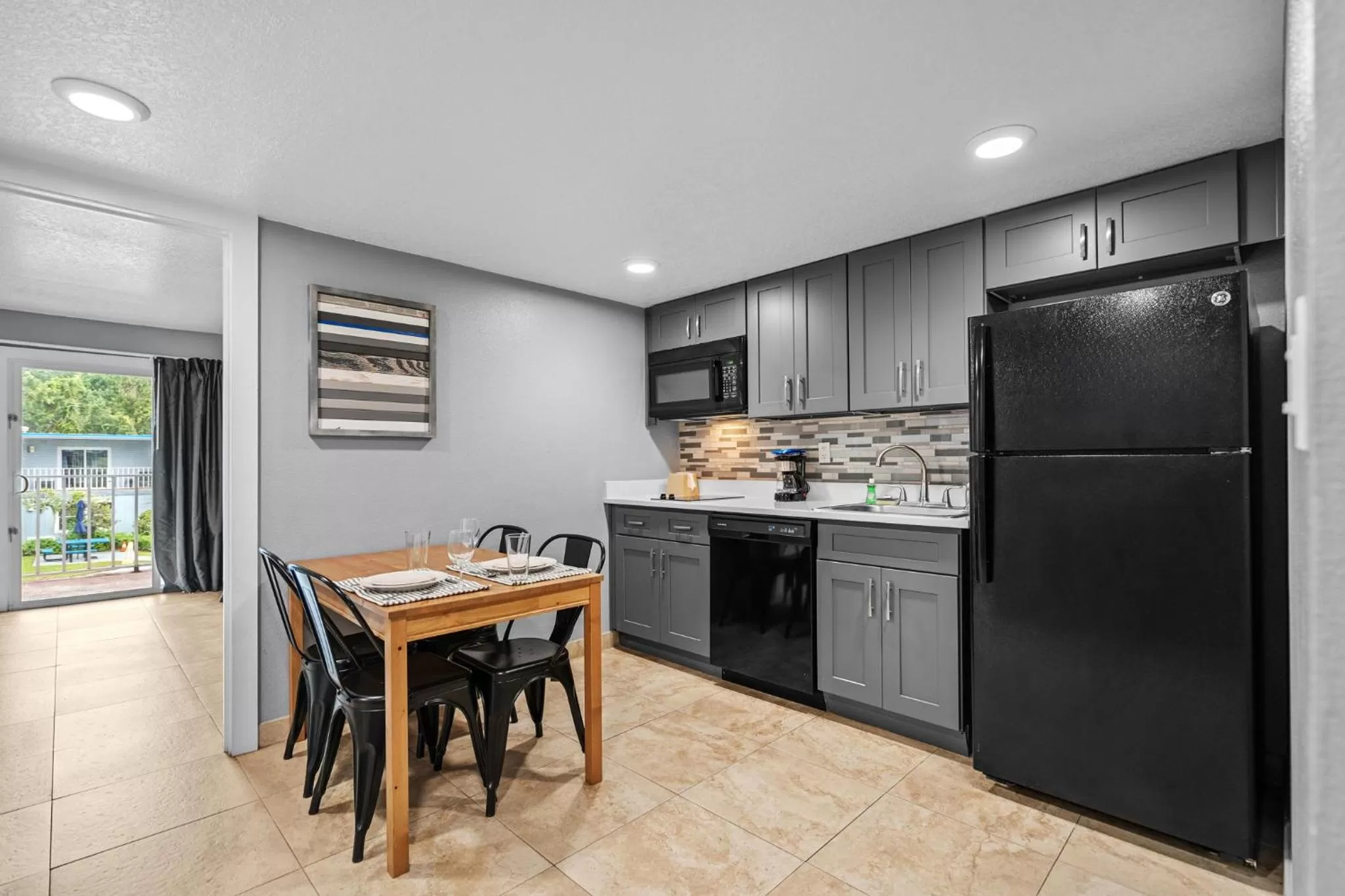 Kitchen or kitchenette in Celebration Suites