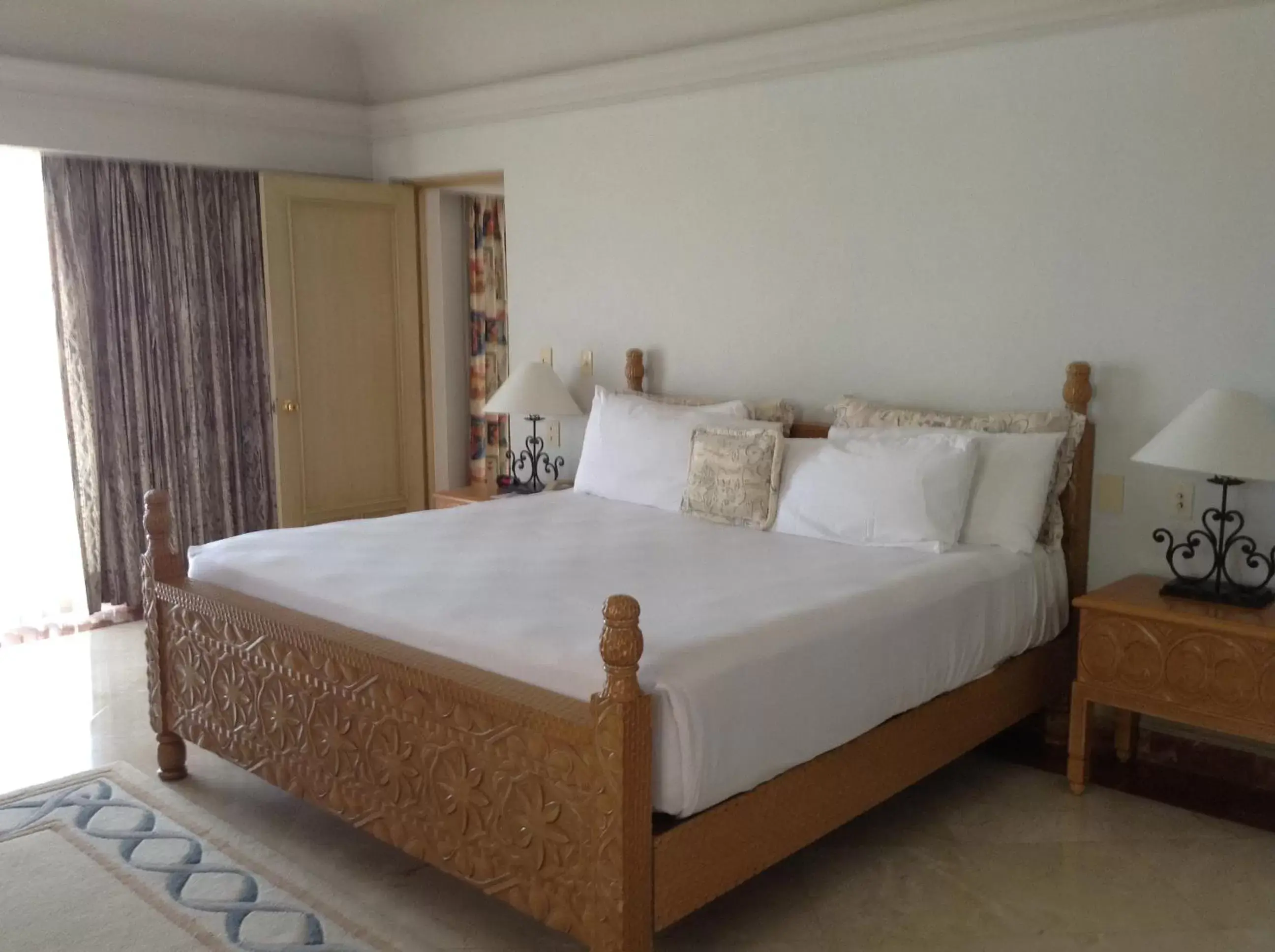 Photo of the whole room, Bed in Grand Isla Navidad Golf & Spa Resort with Marina