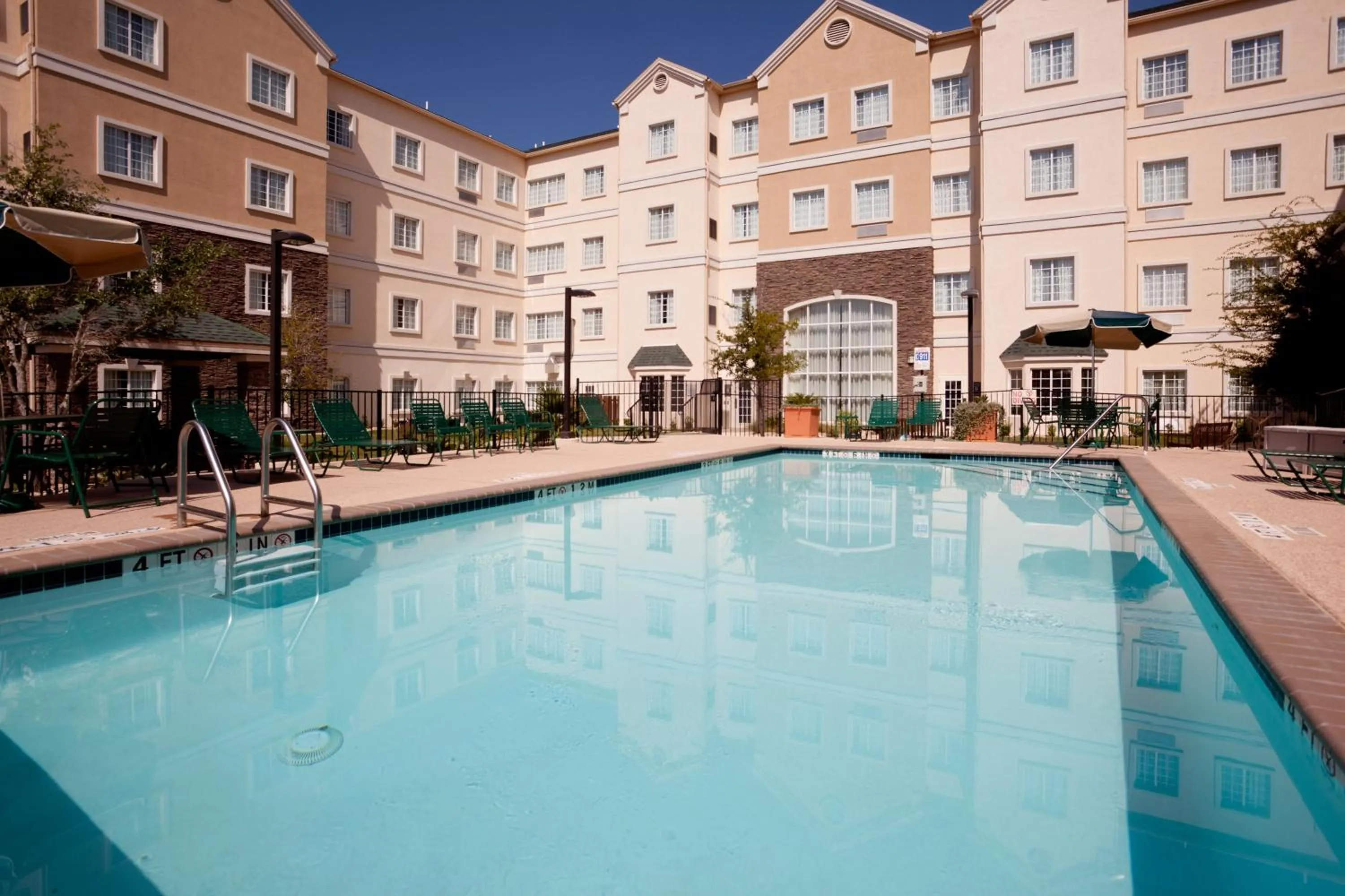 Swimming pool in Staybridge Suites Austin Airport by IHG