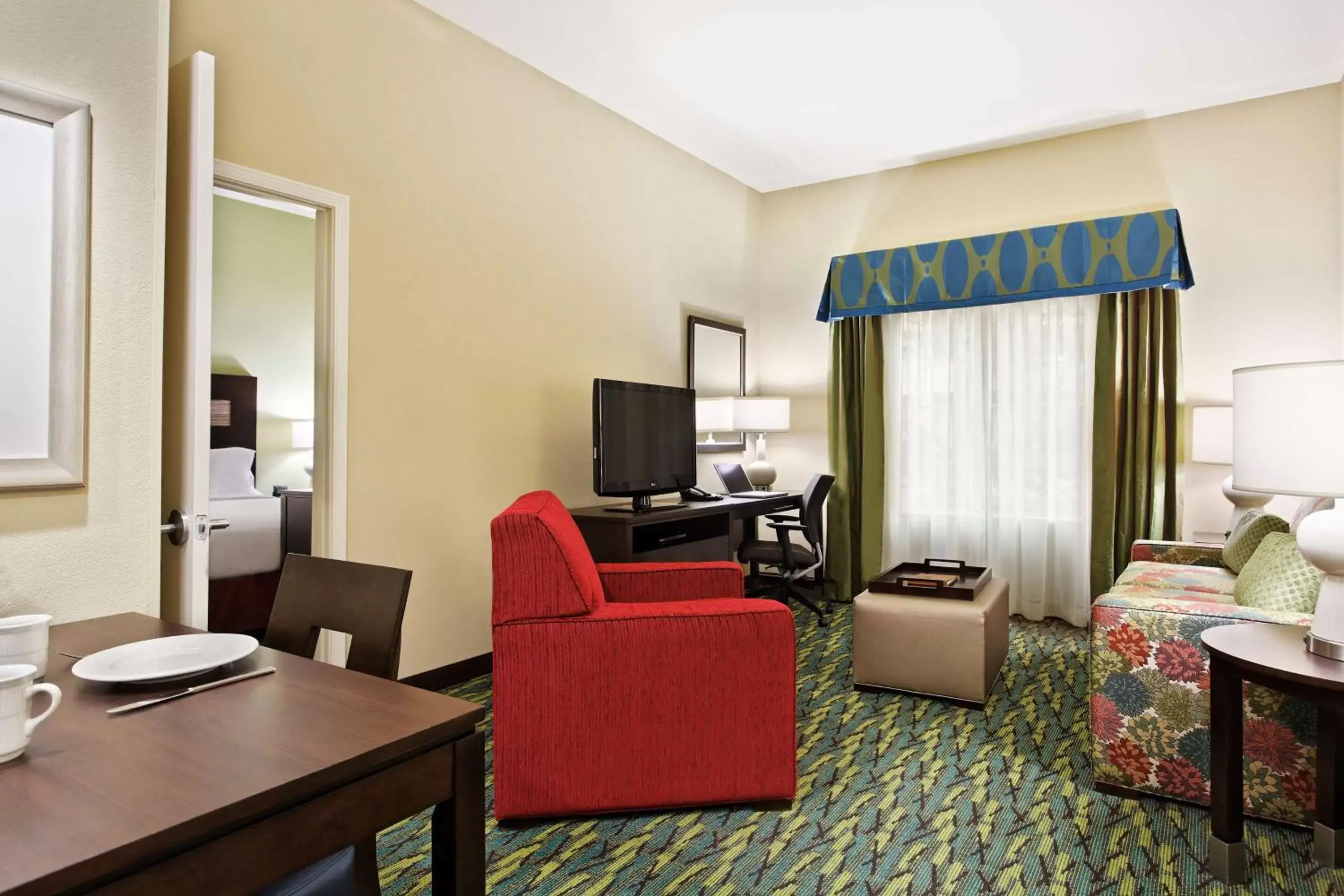 Living room, Seating Area in Homewood Suites by Hilton Orlando Airport