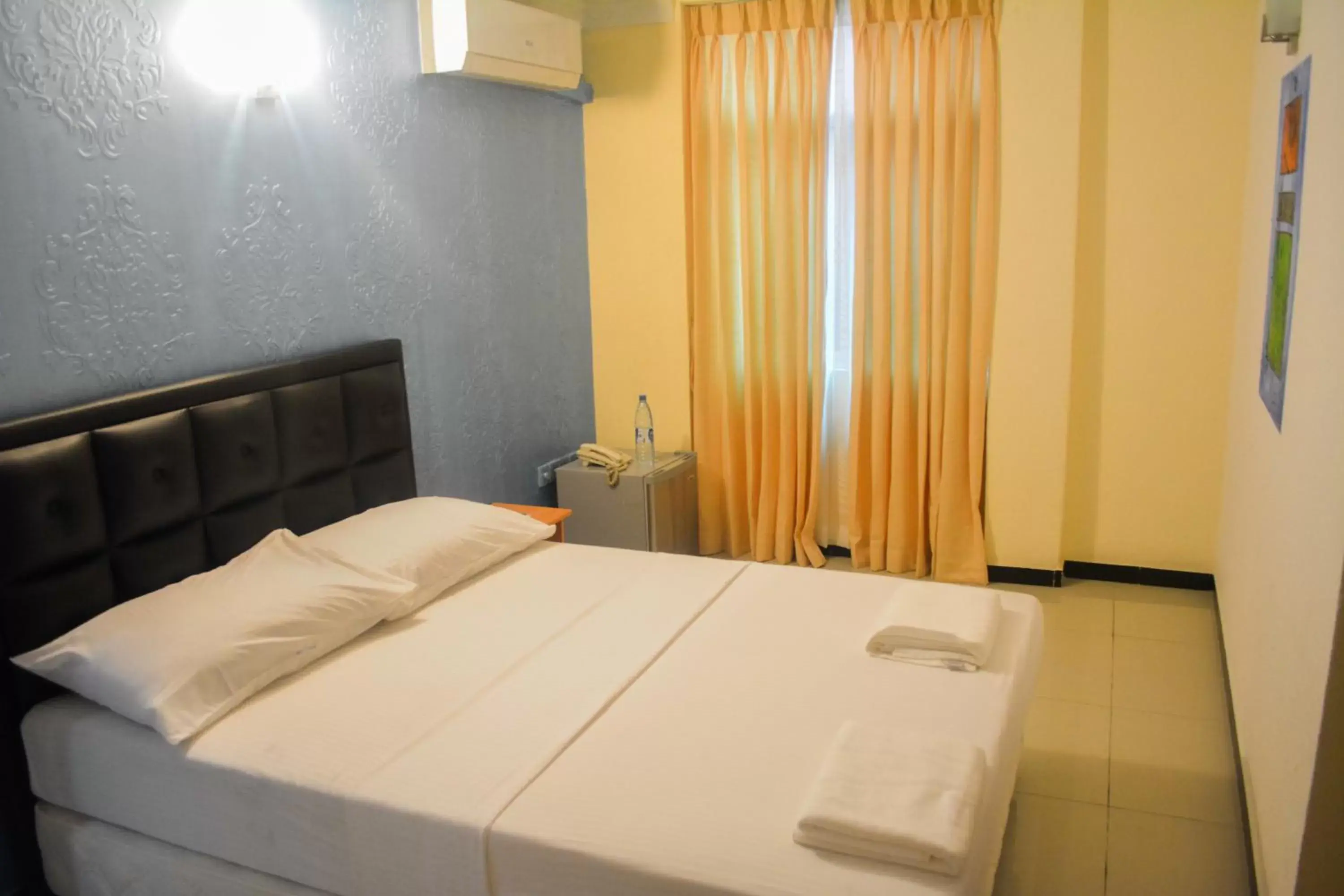 Bedroom, Bed in Saasha City Hotel