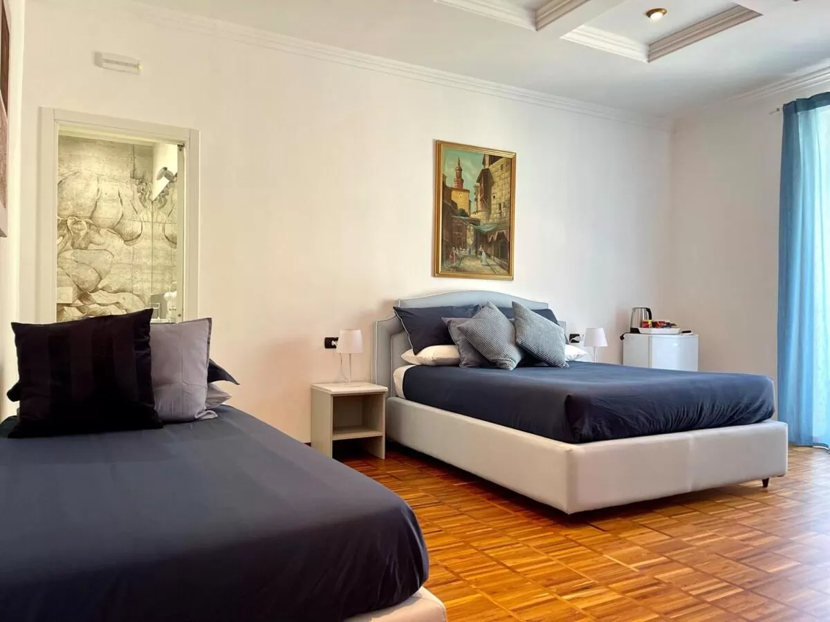 Bed in Tribus Boutique Hotel