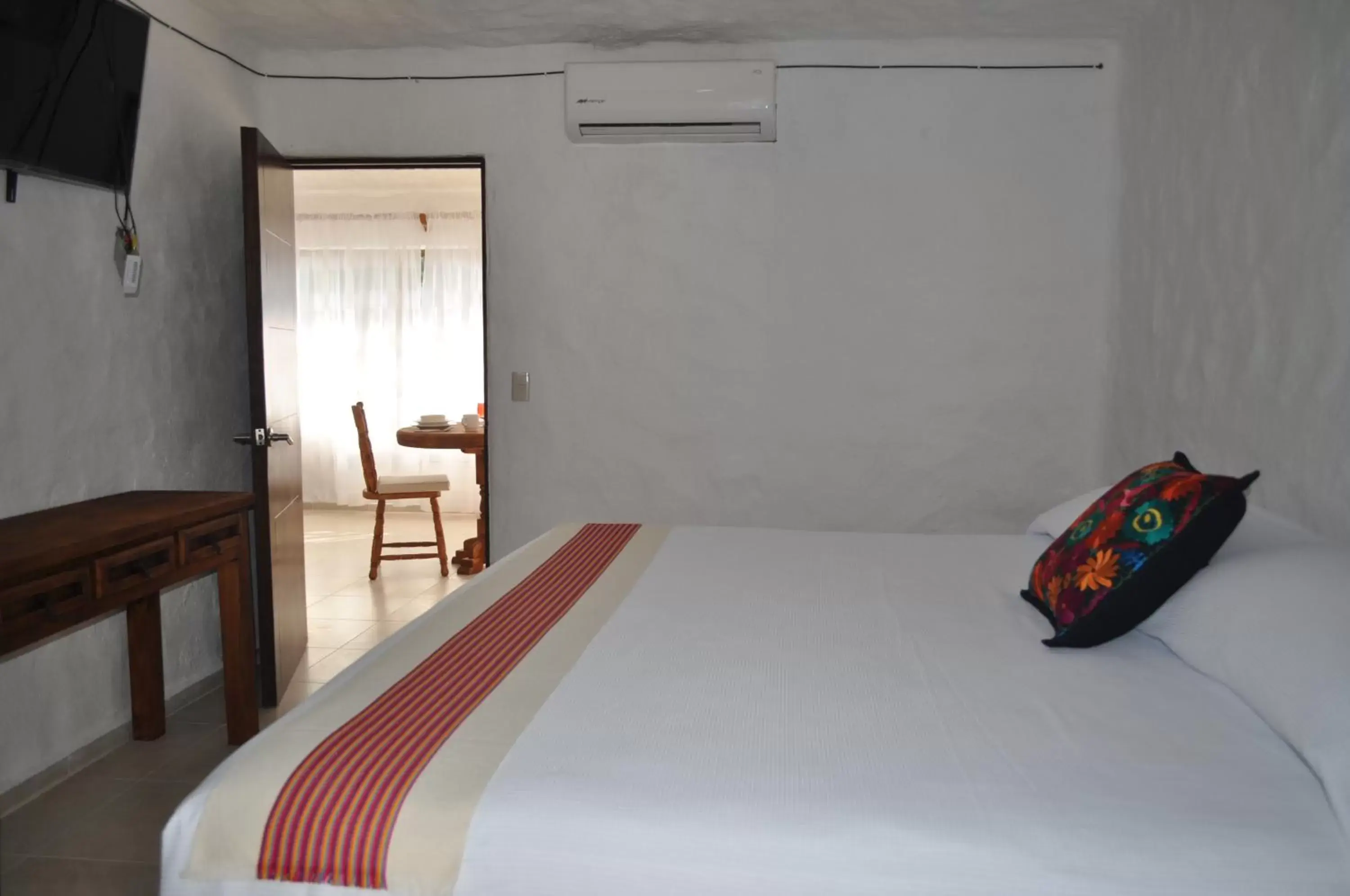 Bed in Petit Hotel Pilitas
