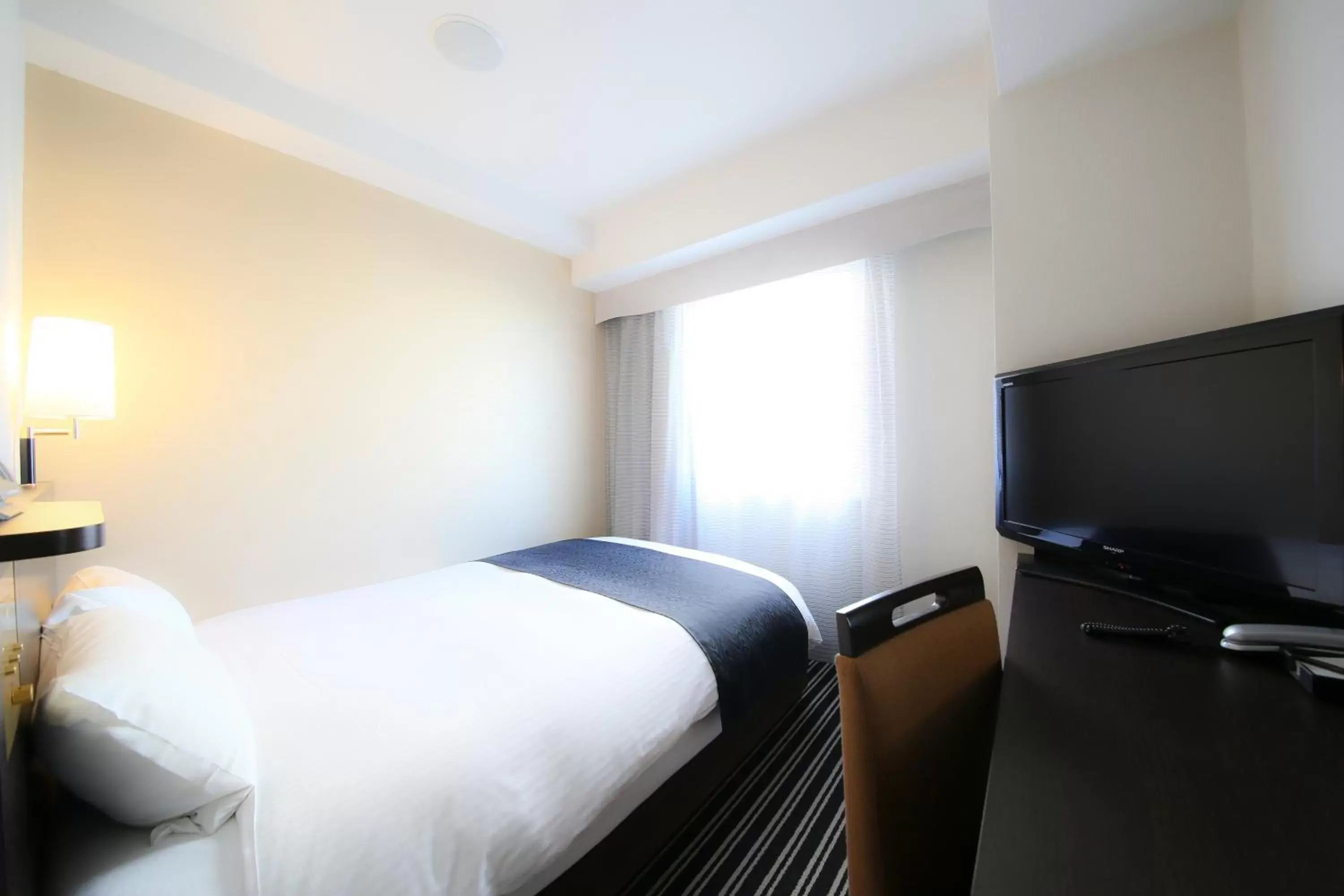 Bedroom, Bed in APA Hotel Kagoshima Tenmonkan
