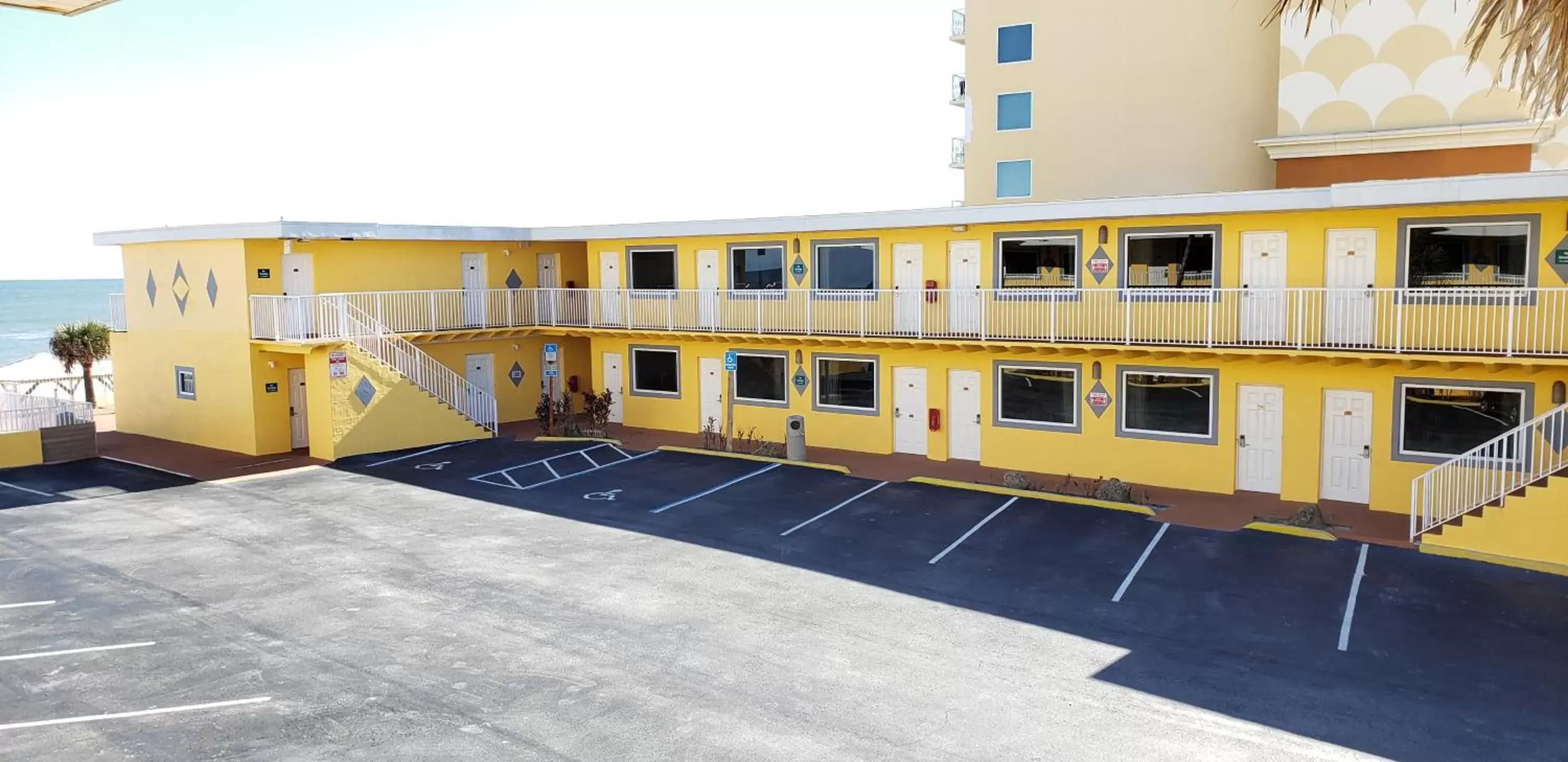 Property building in Oceanfront Inn and Suites - Ormond Property building in Oceanfront Inn and Suites - Ormond