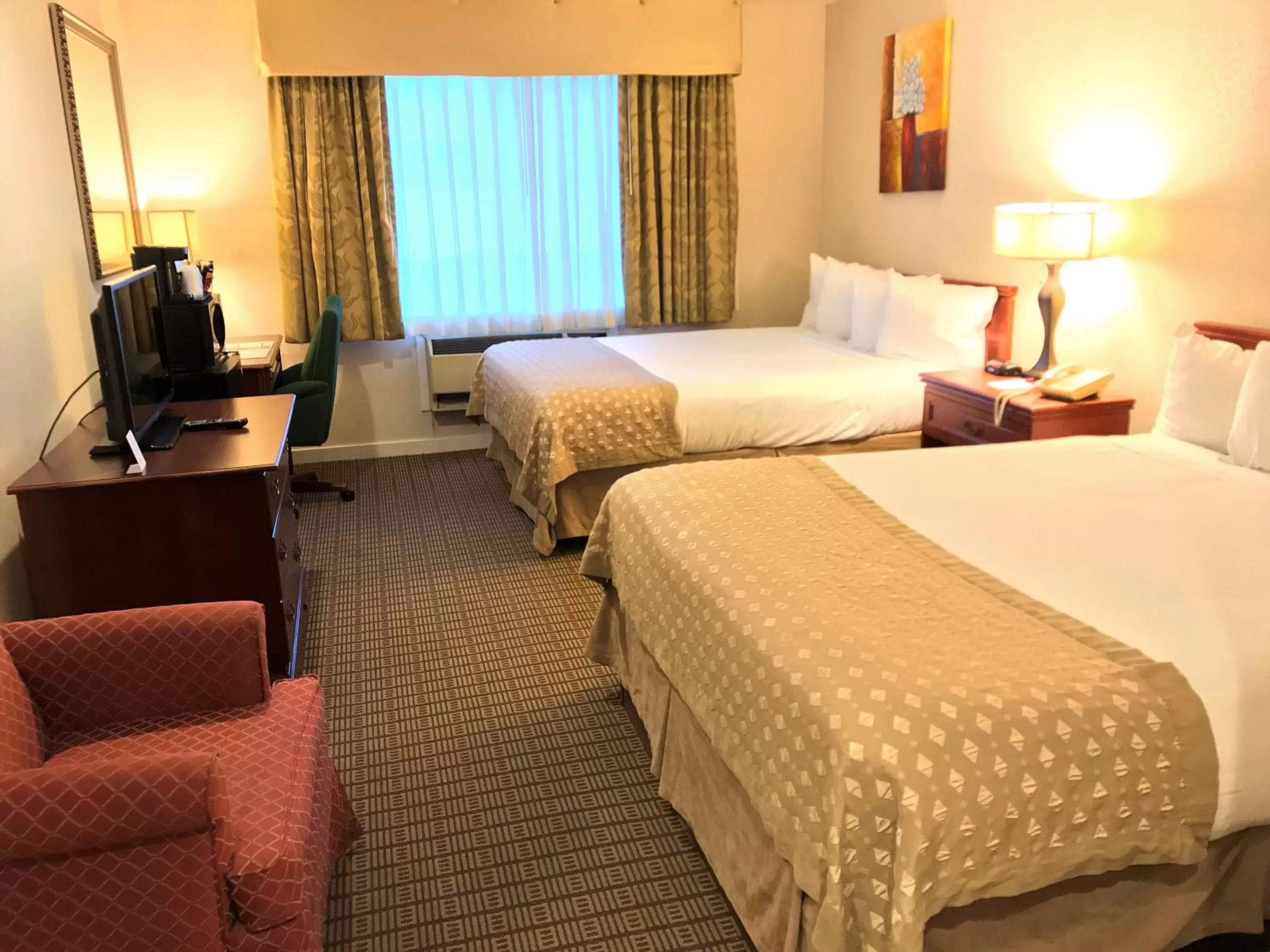 Photo of the whole room, Bed in Ramada by Wyndham Draper, Utah