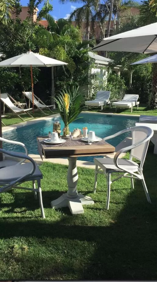 Dining area, Swimming Pool in Mahona Boutique Hotel