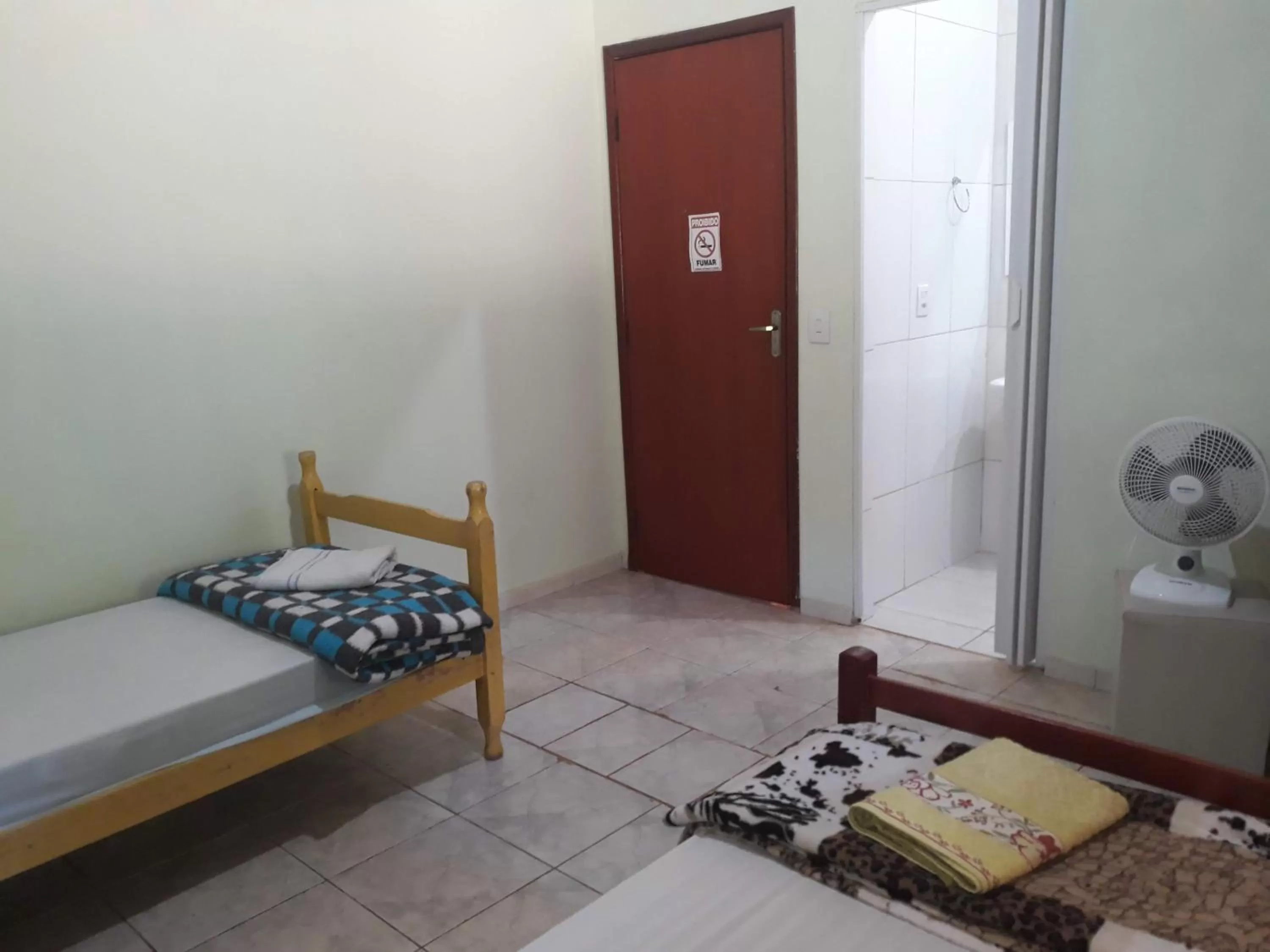 Bed in Pousada do Ribeirão