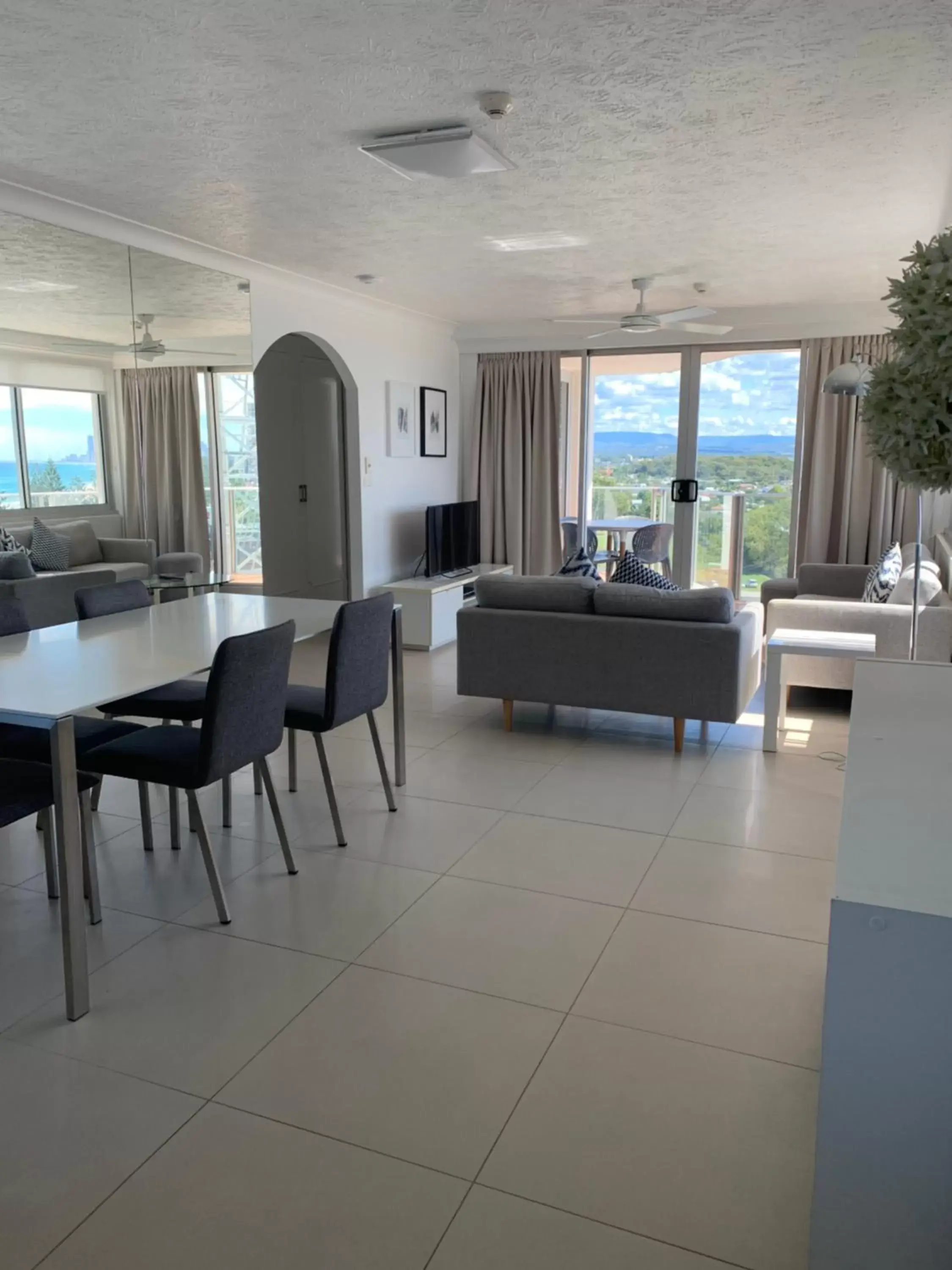 Living room in Pacific Regis Beachfront Holiday Apartments