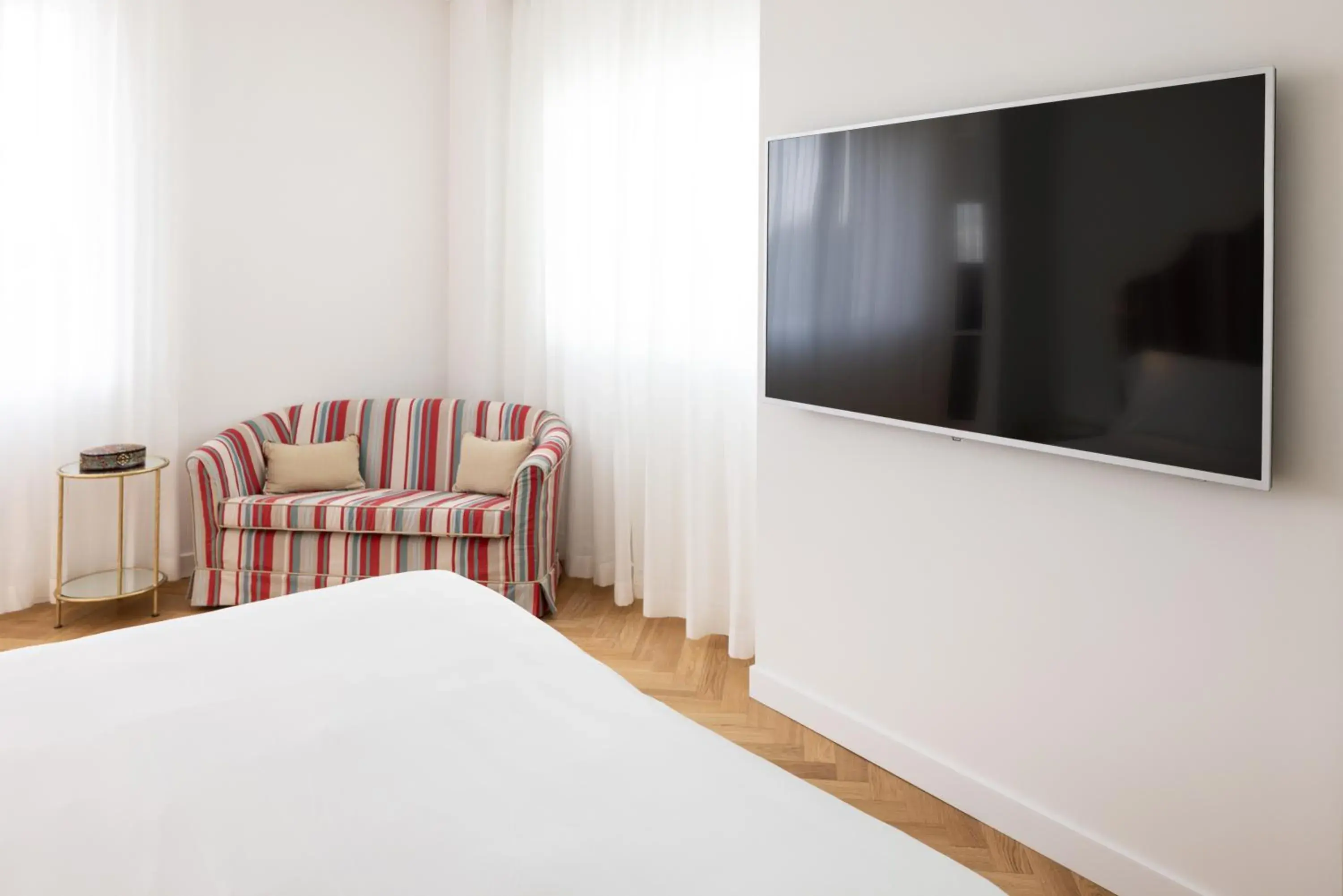 Bedroom, TV/Entertainment Center in Hotel Morfeo