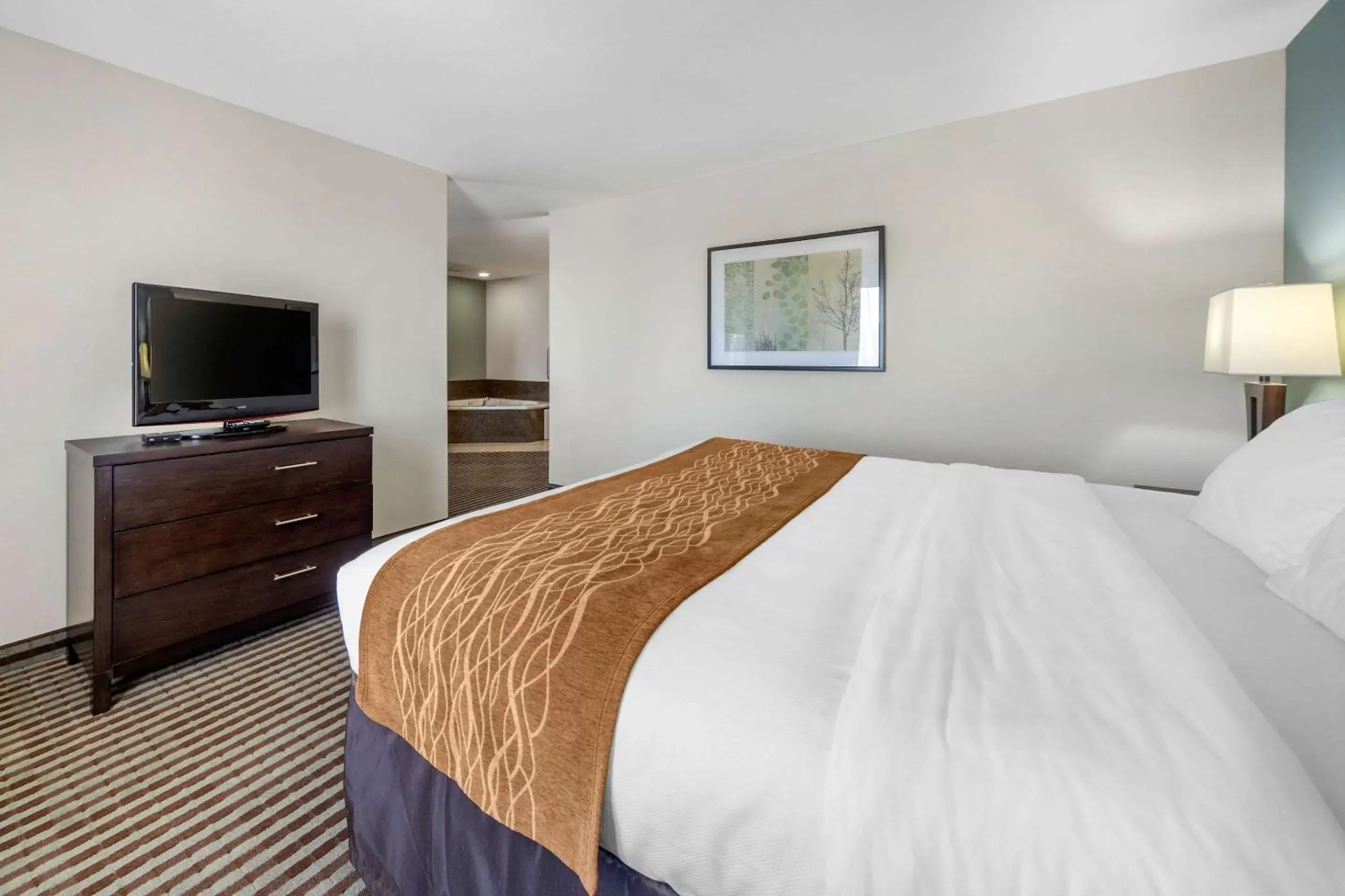 Photo of the whole room, Bed in Comfort Inn & Suites Perry I-35