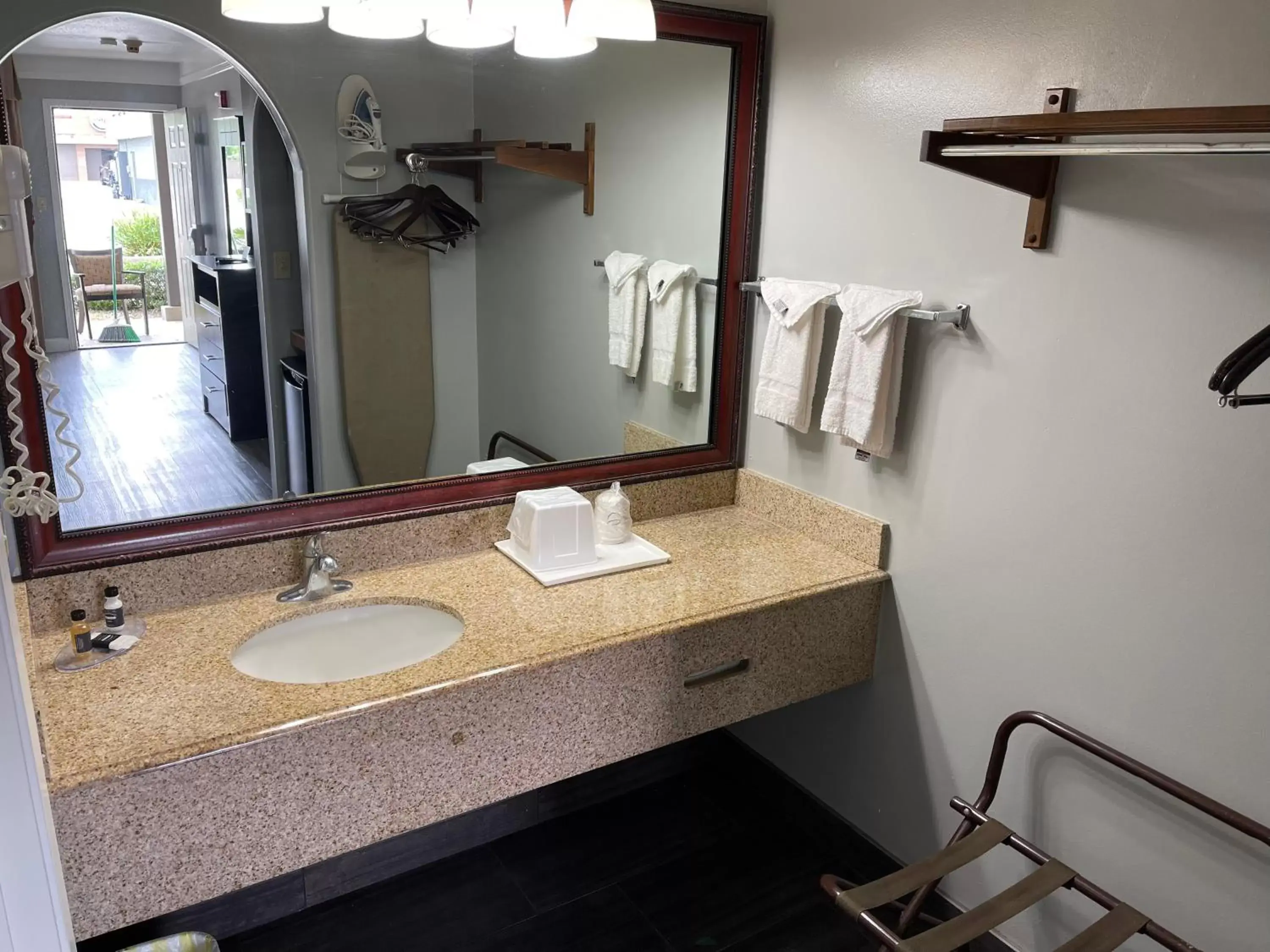 Bathroom in Super 6 Inn & Suites