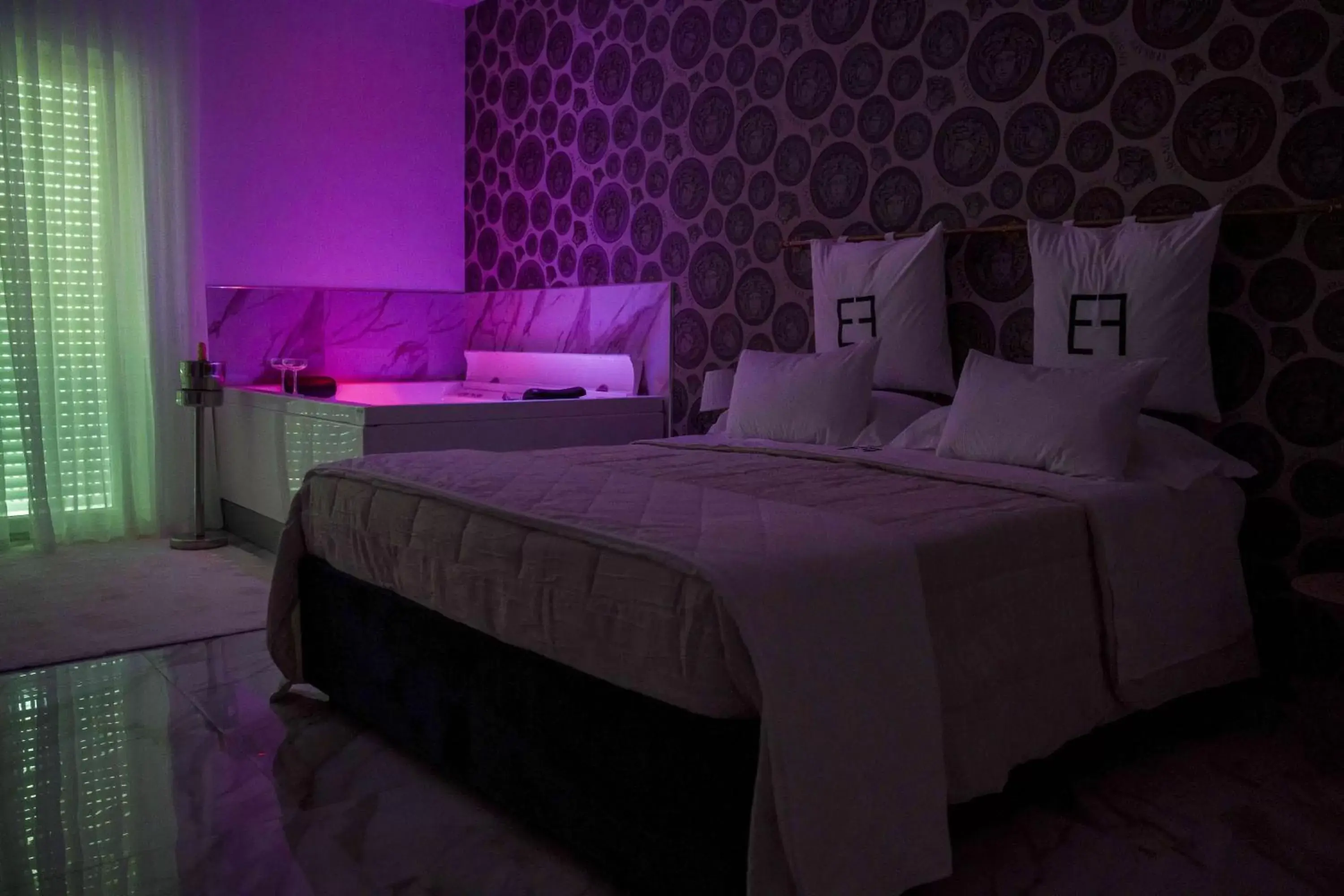 Bed in EF LUXURY LIVING RESORT AND SPA