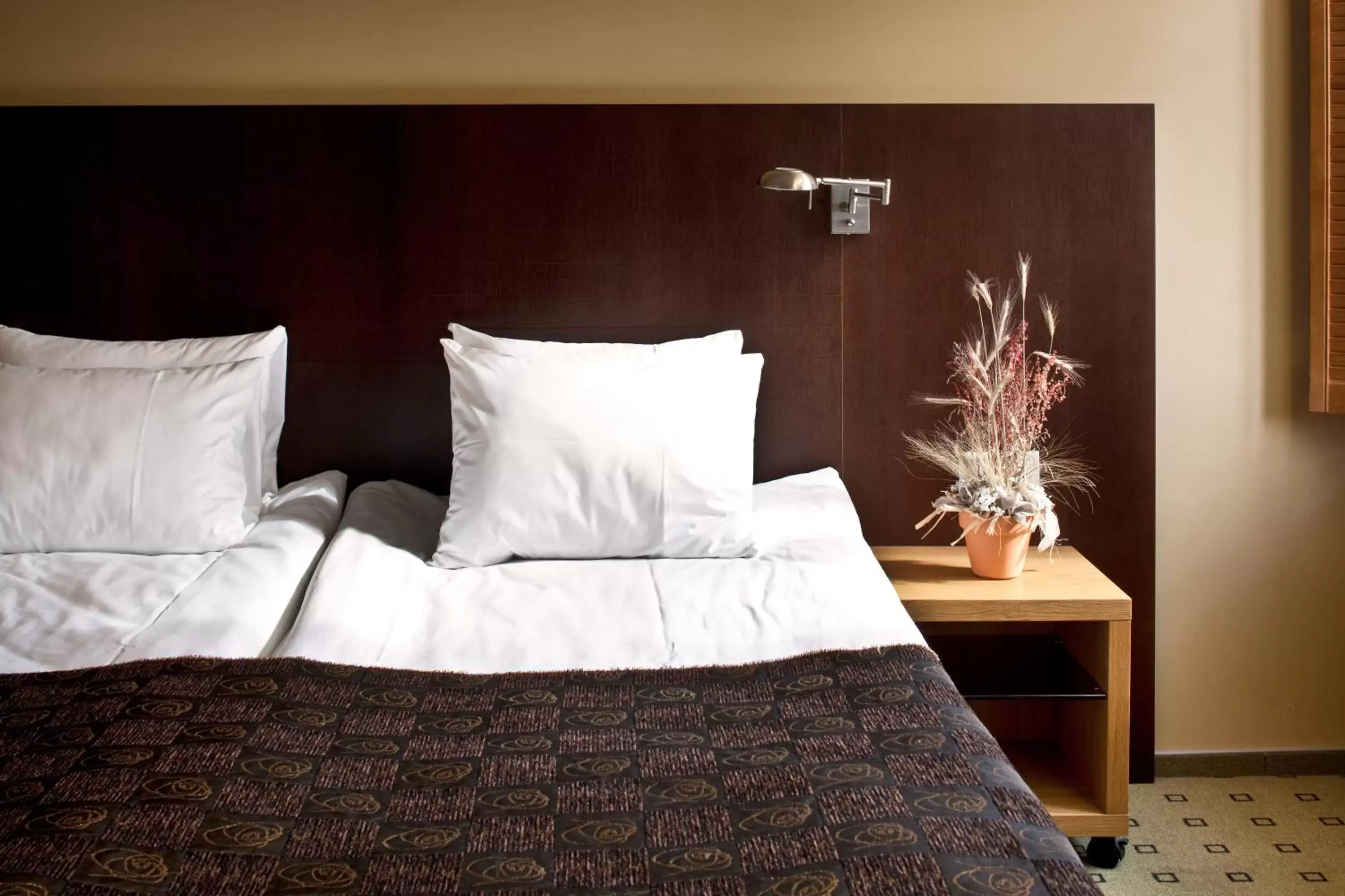 Bed in Hanza Hotel