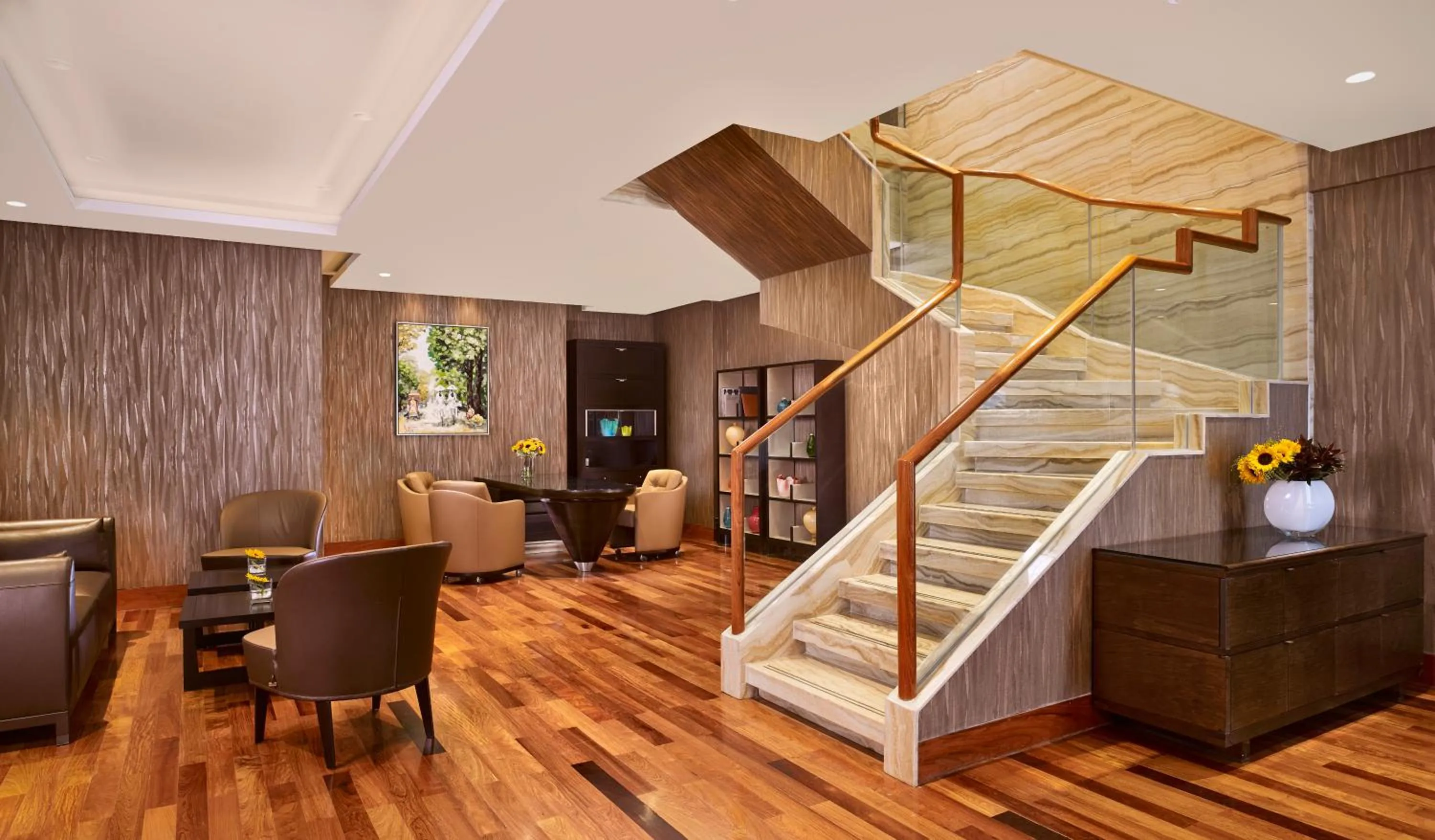 Communal lounge/ TV room in The Reverie Saigon Residential Suites