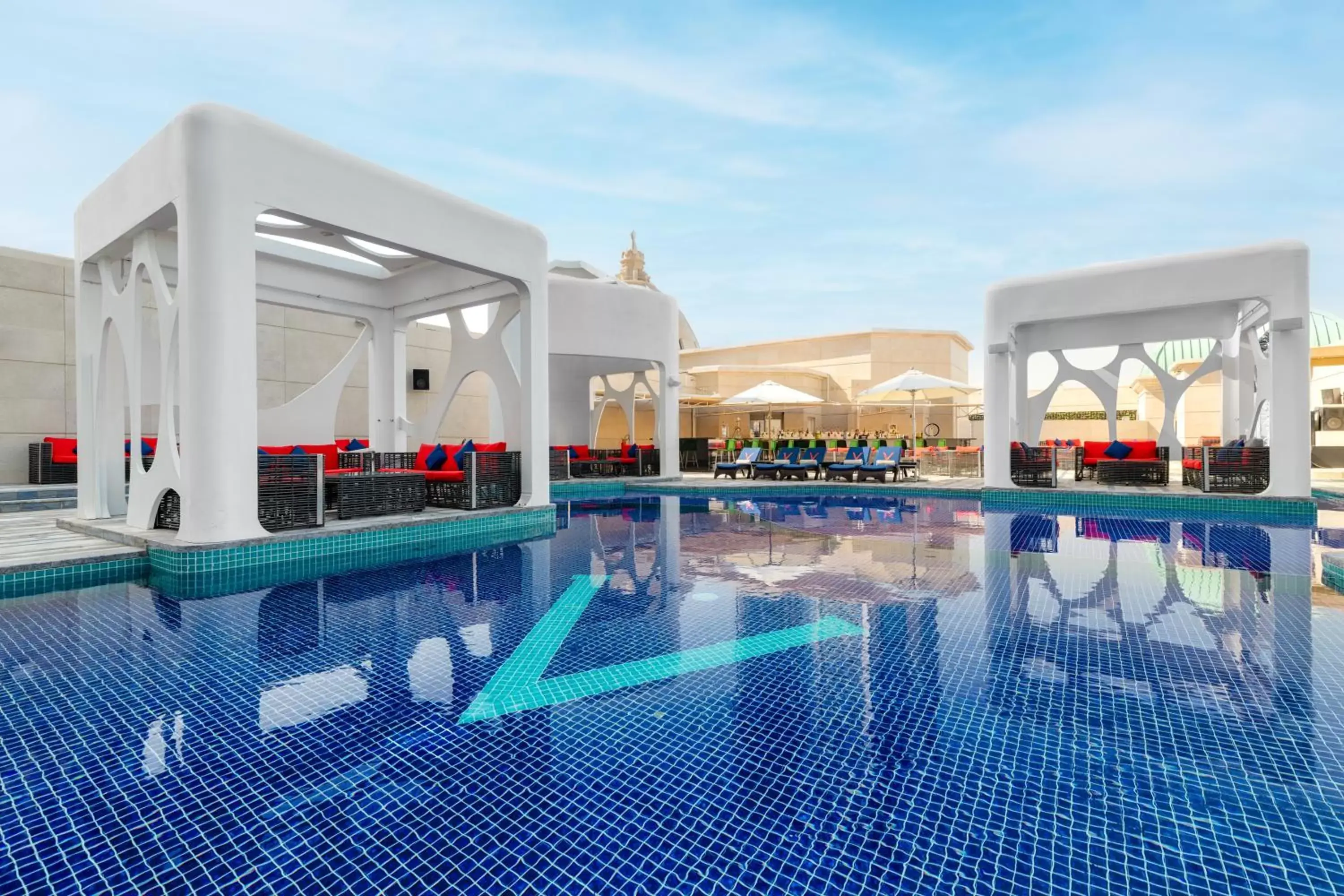Swimming Pool in V Hotel Dubai, Curio Collection by Hilton