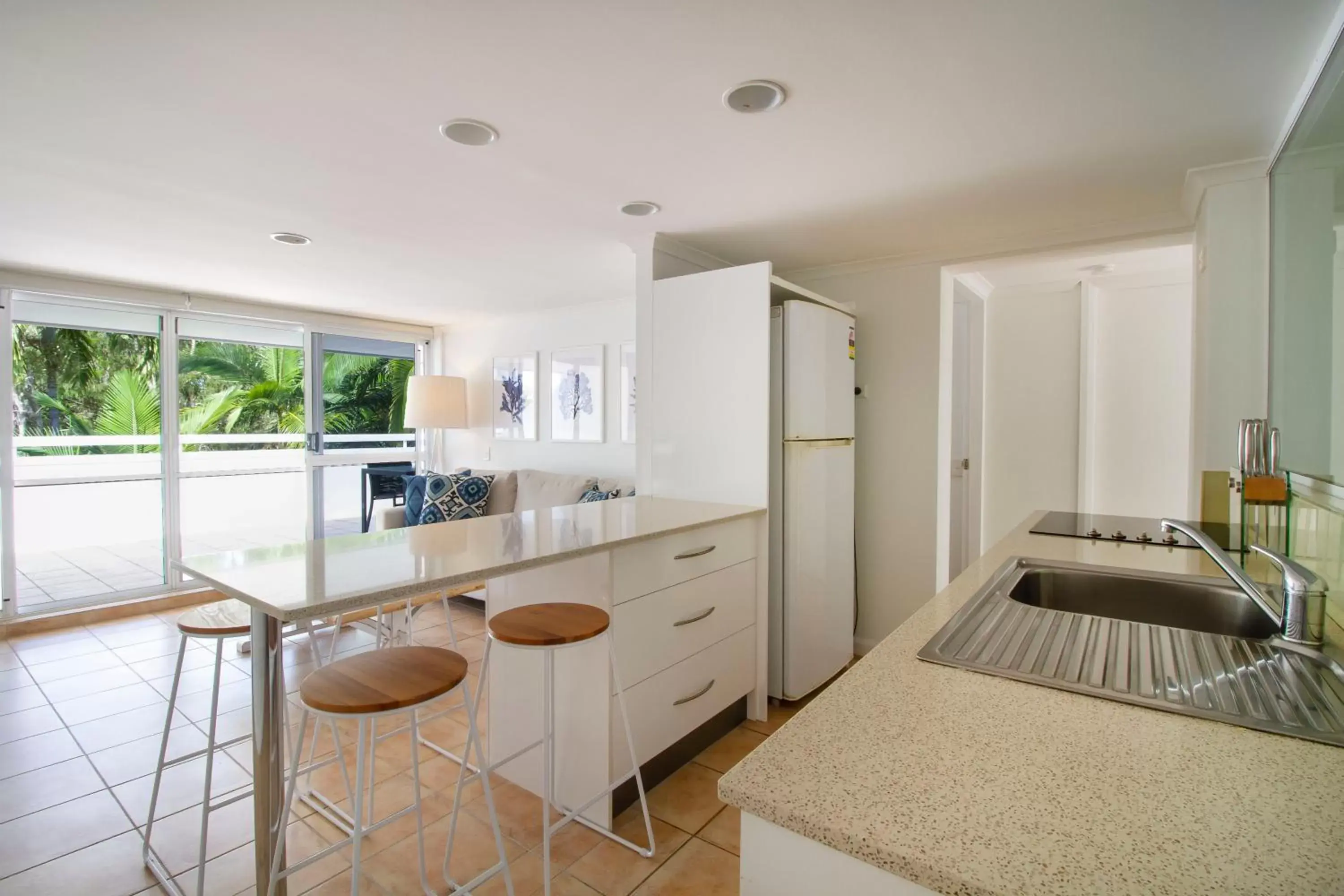 Kitchen/Kitchenette in The White House Port Douglas