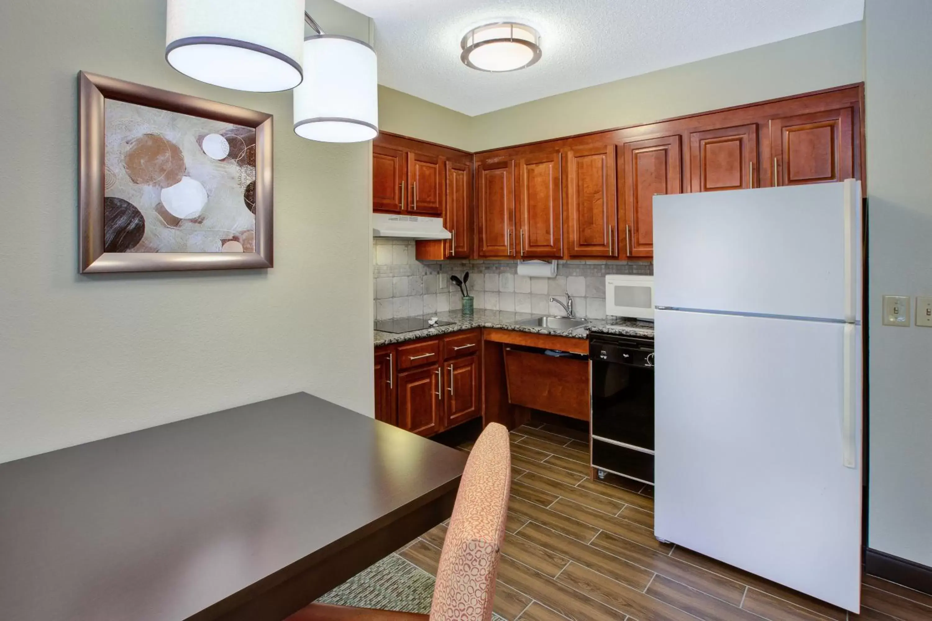 Photo of the whole room, Kitchen/Kitchenette in Staybridge Suites Louisville - East, an IHG Hotel