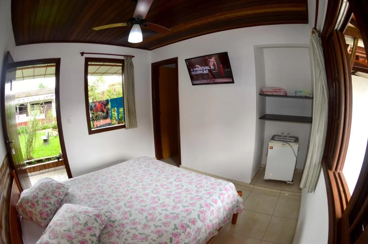 Bed in Cantinho da Geisa - suítes mobiliadas