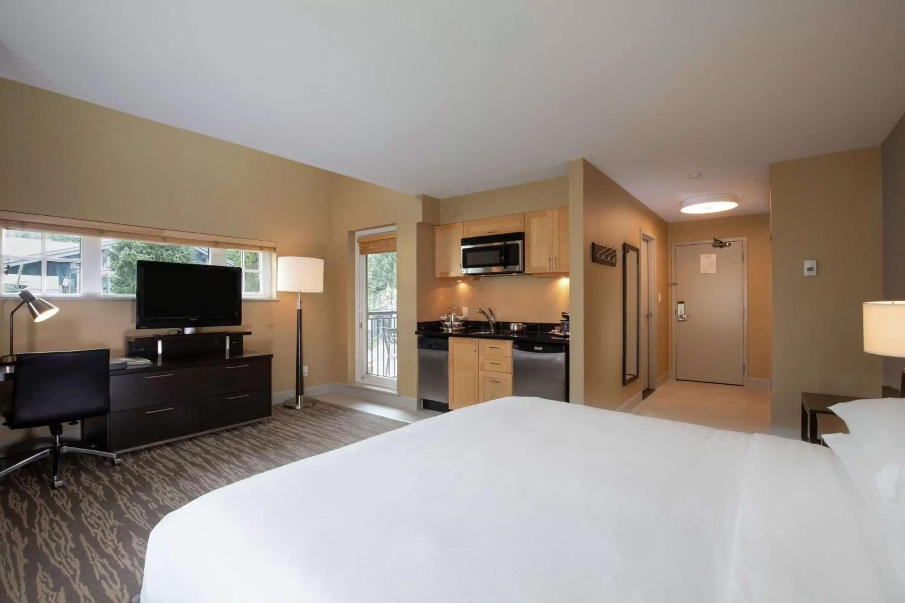 Bedroom, TV/Entertainment Center in Hilton Whistler Resort & Spa