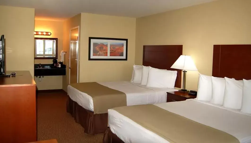 Bed in Southern Inn & Suites Lamesa