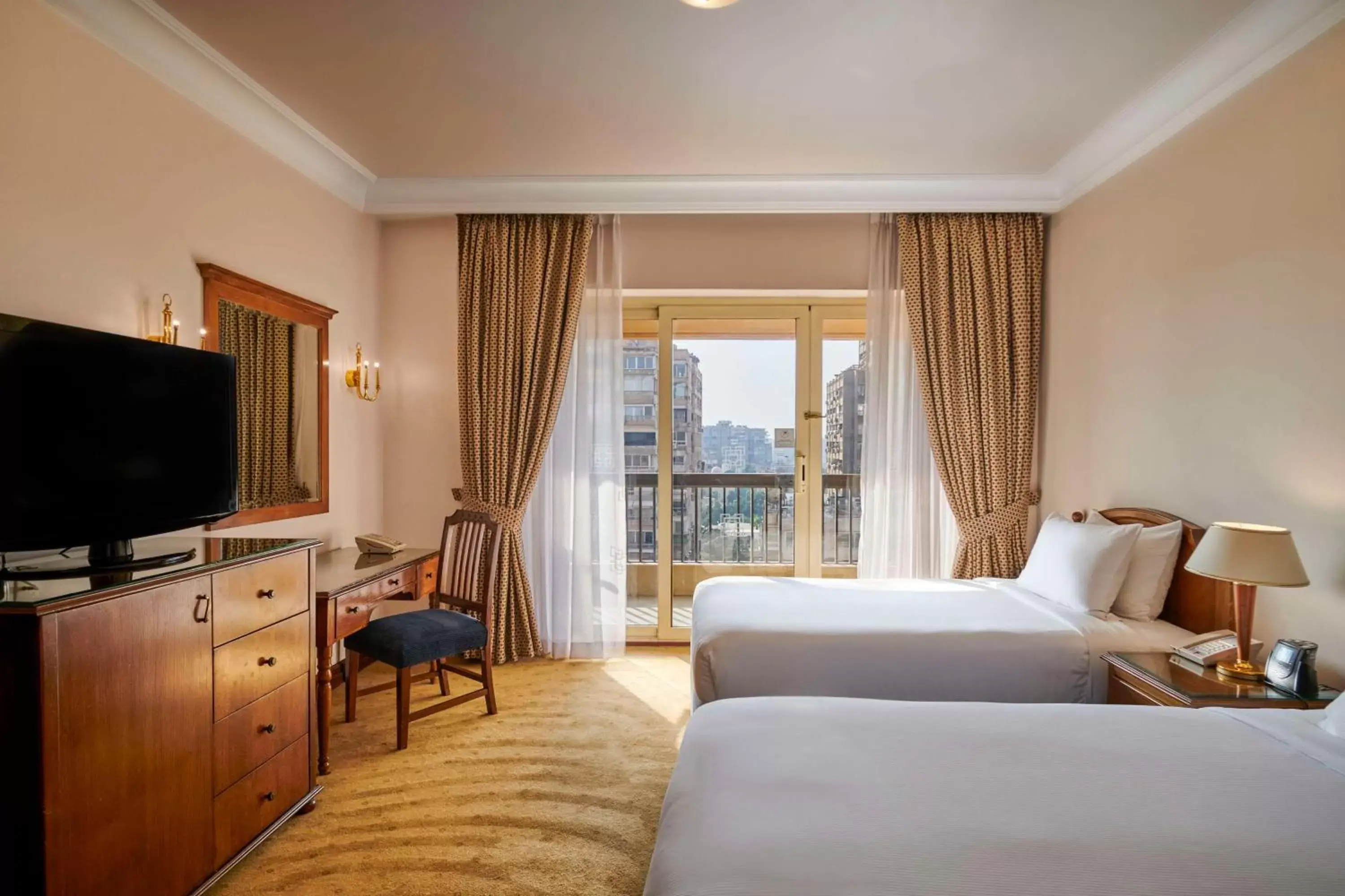 Bedroom, TV/Entertainment Center in Hilton Cairo Zamalek Residences