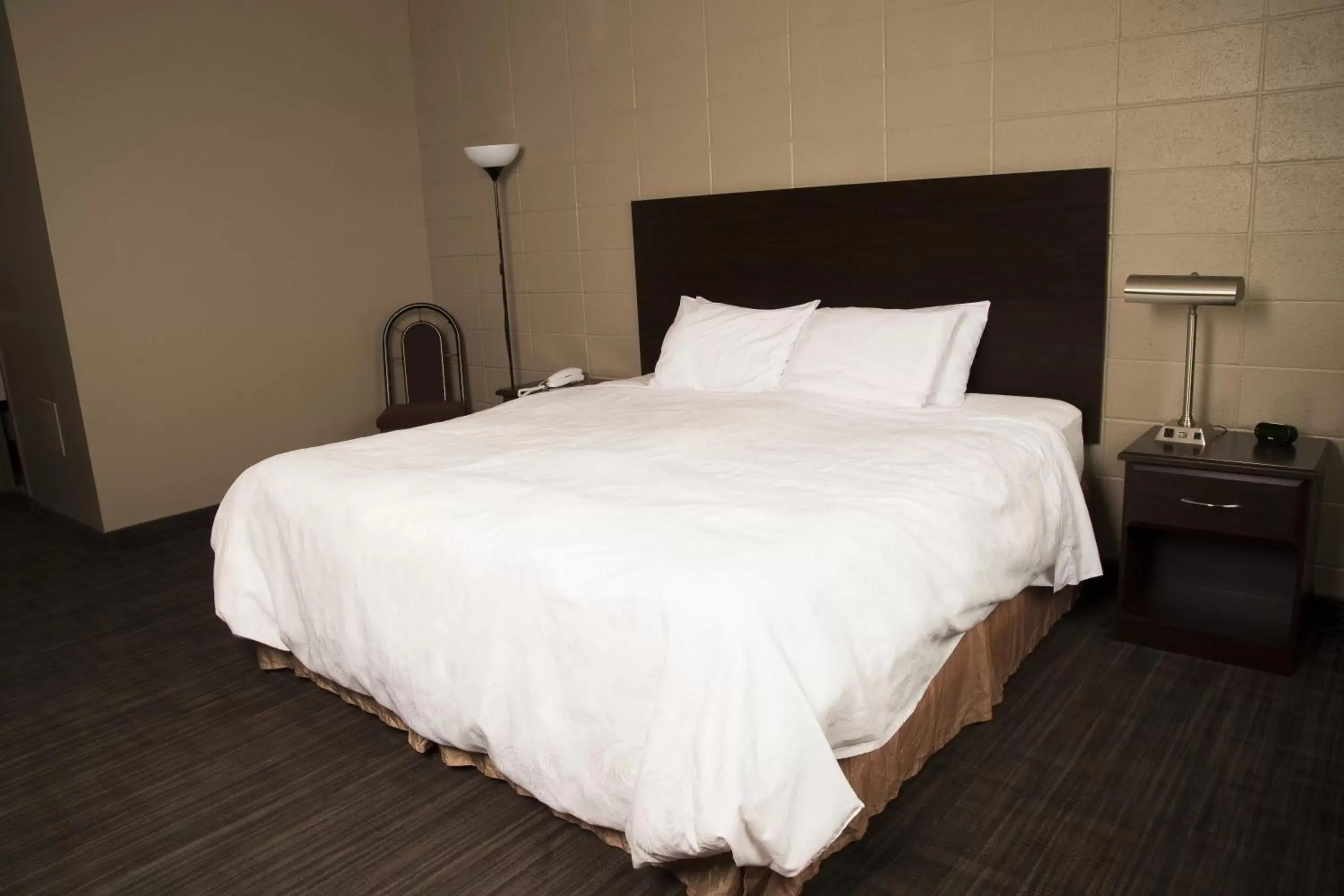 Bed in Sandstone Motel