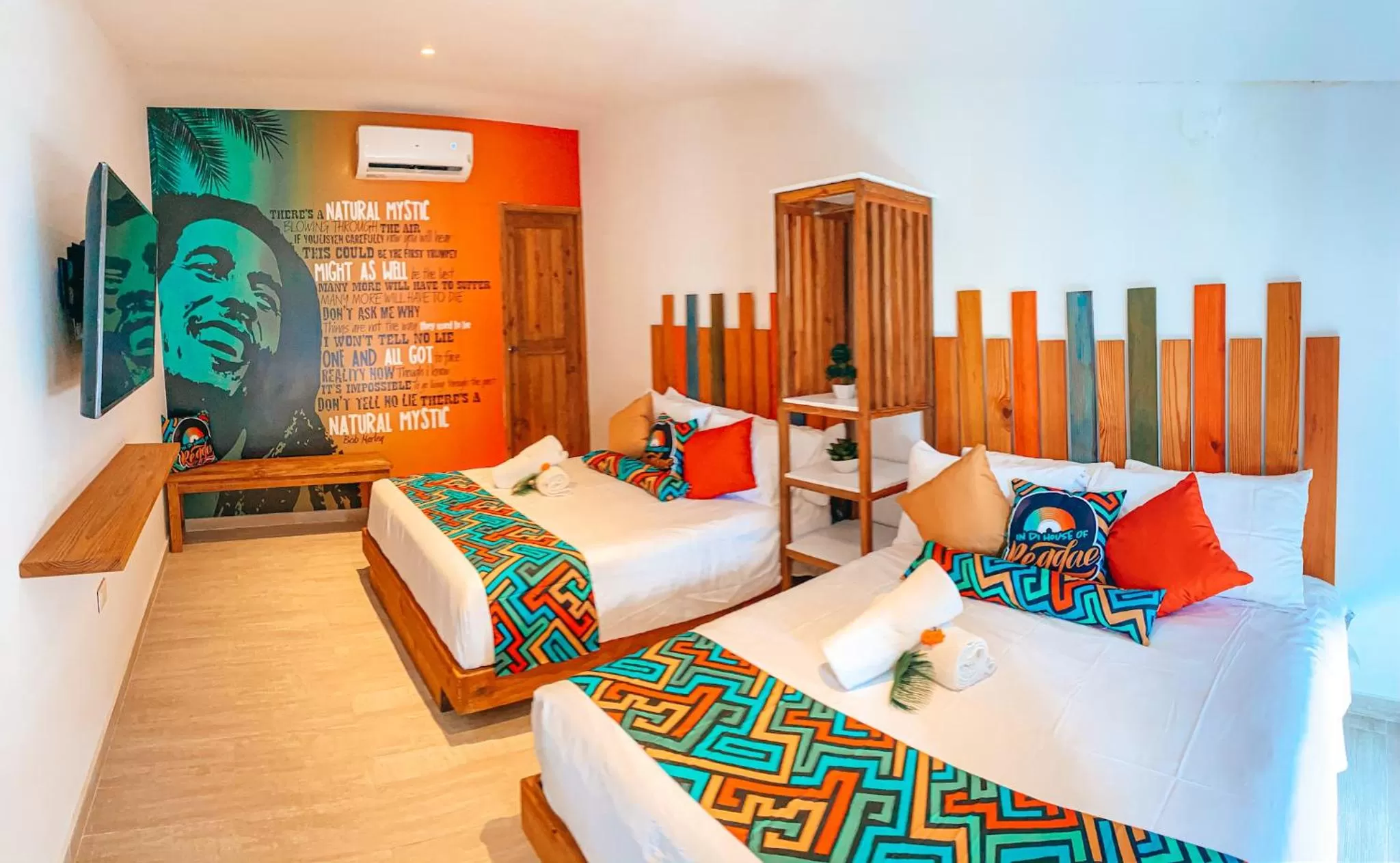 Photo of the whole room, Bed in In Di House of Reggae Boutique