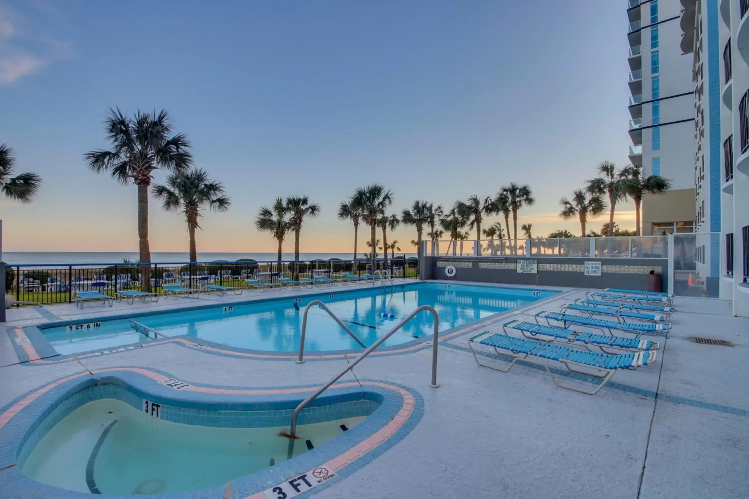 Swimming Pool in Boardwalk Beach Resort Condo w Oceanfront Balcony