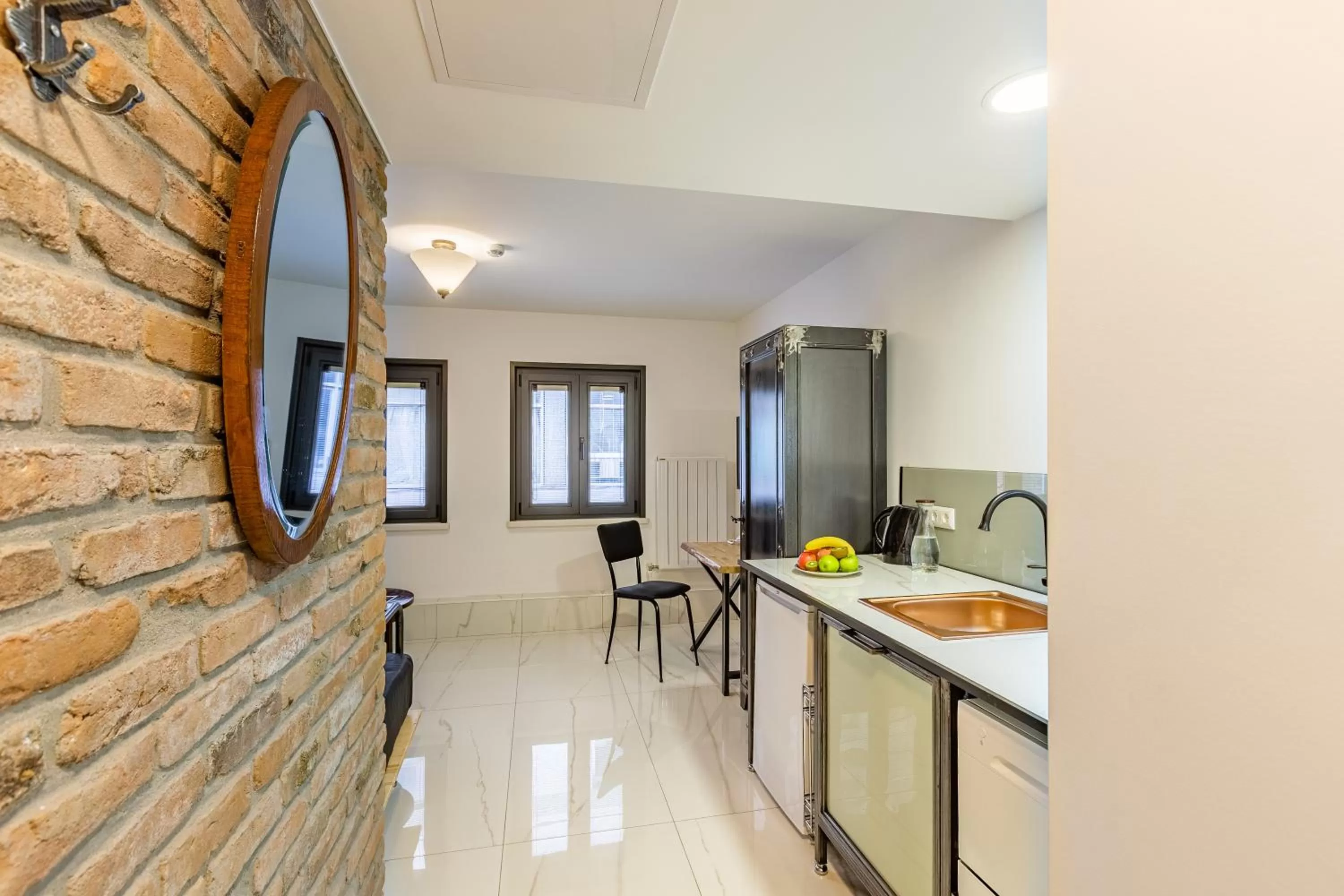 Kitchen or kitchenette in Villa Pera Suite Hotel