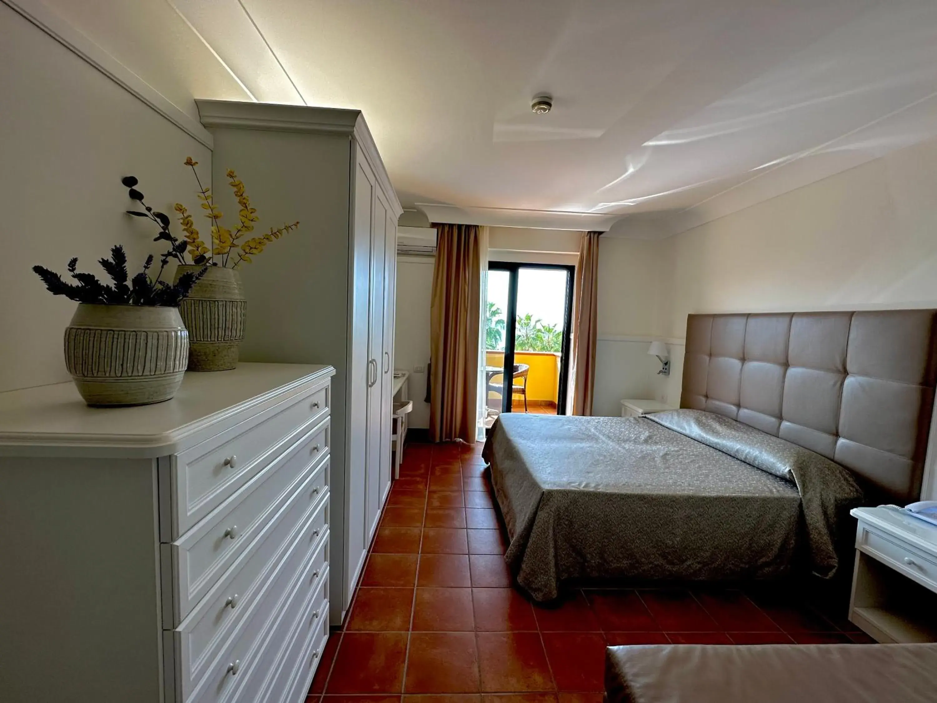 Bedroom in Baia Di Ulisse Wellness & Spa