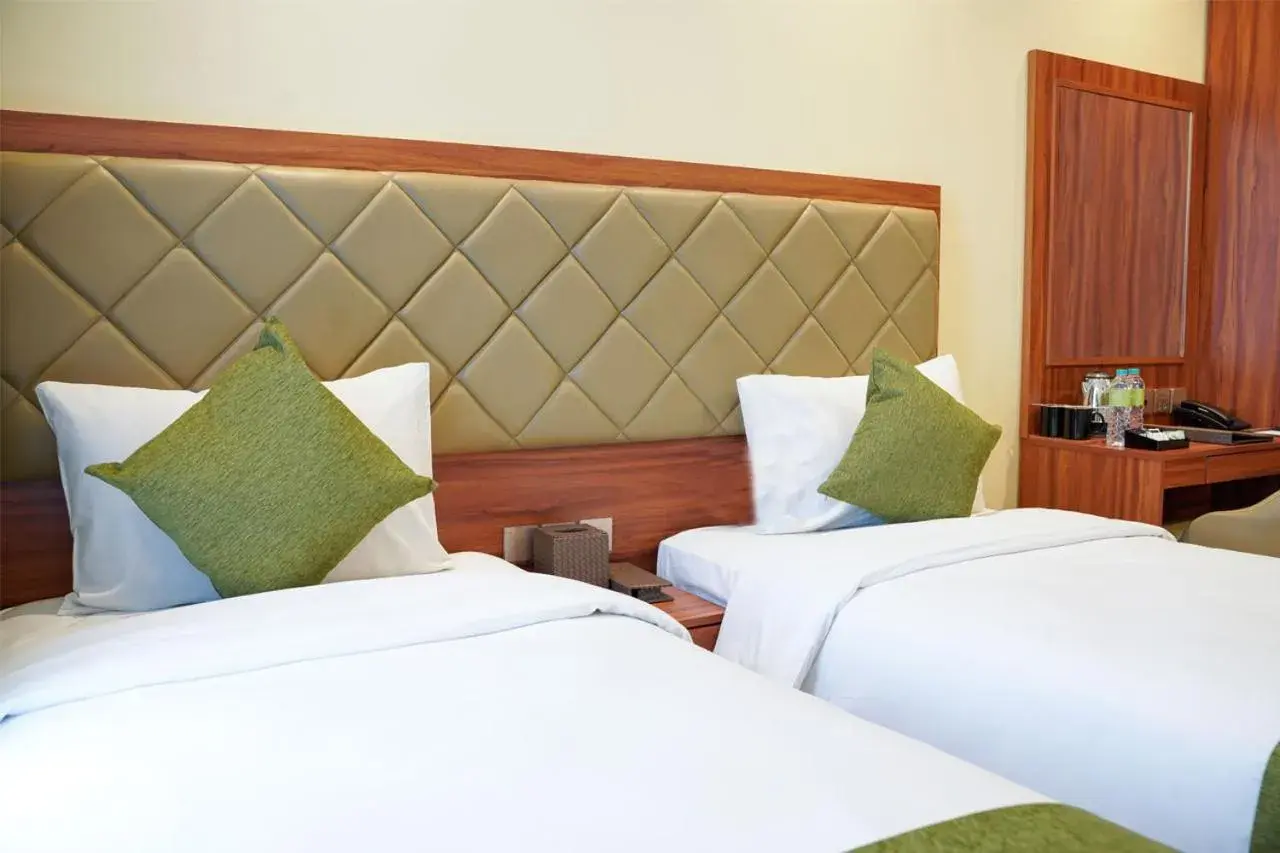 Bed in Luxury Inn Arion Hotel