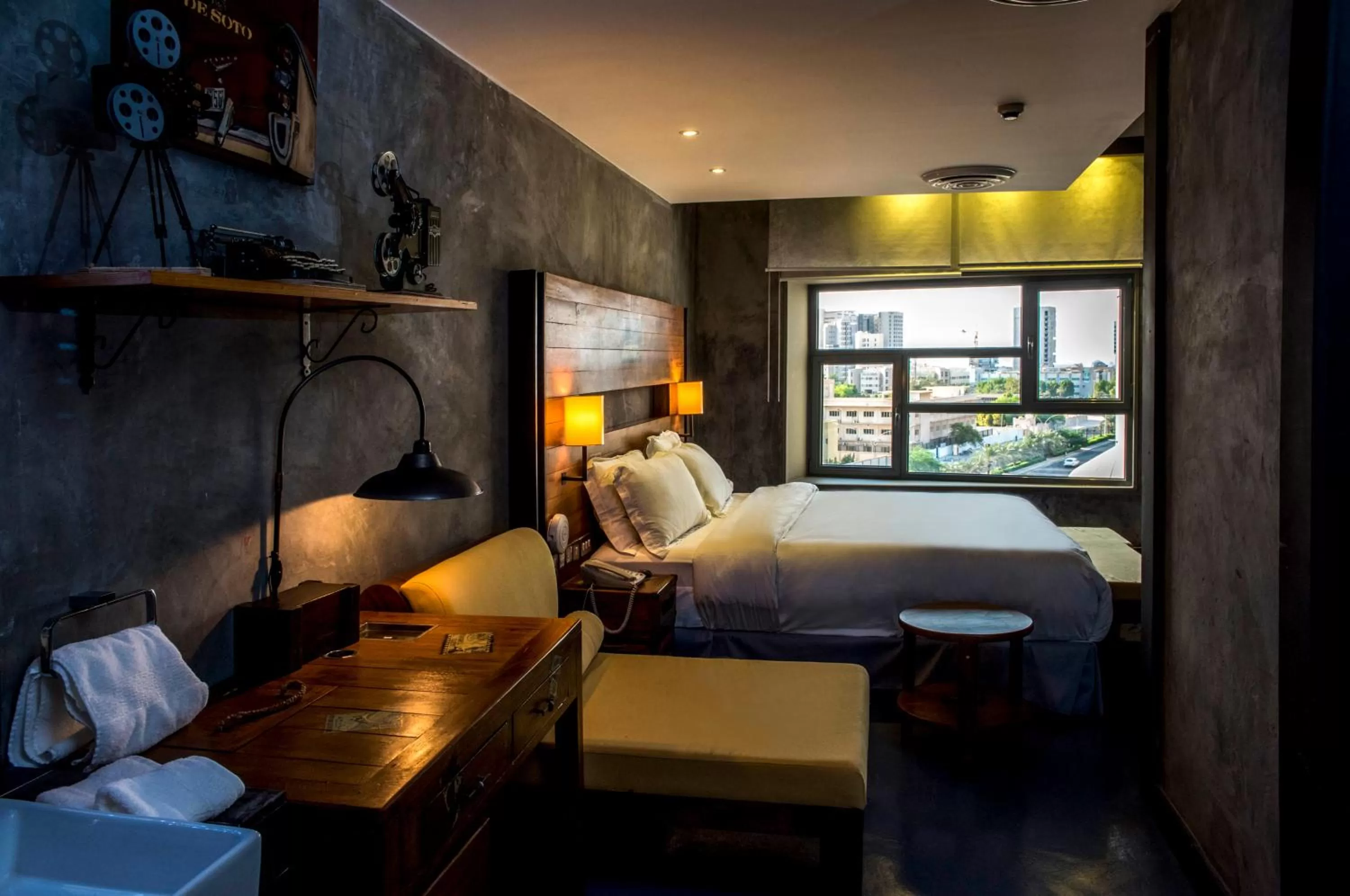 Bed in Flowery Holiday Suites