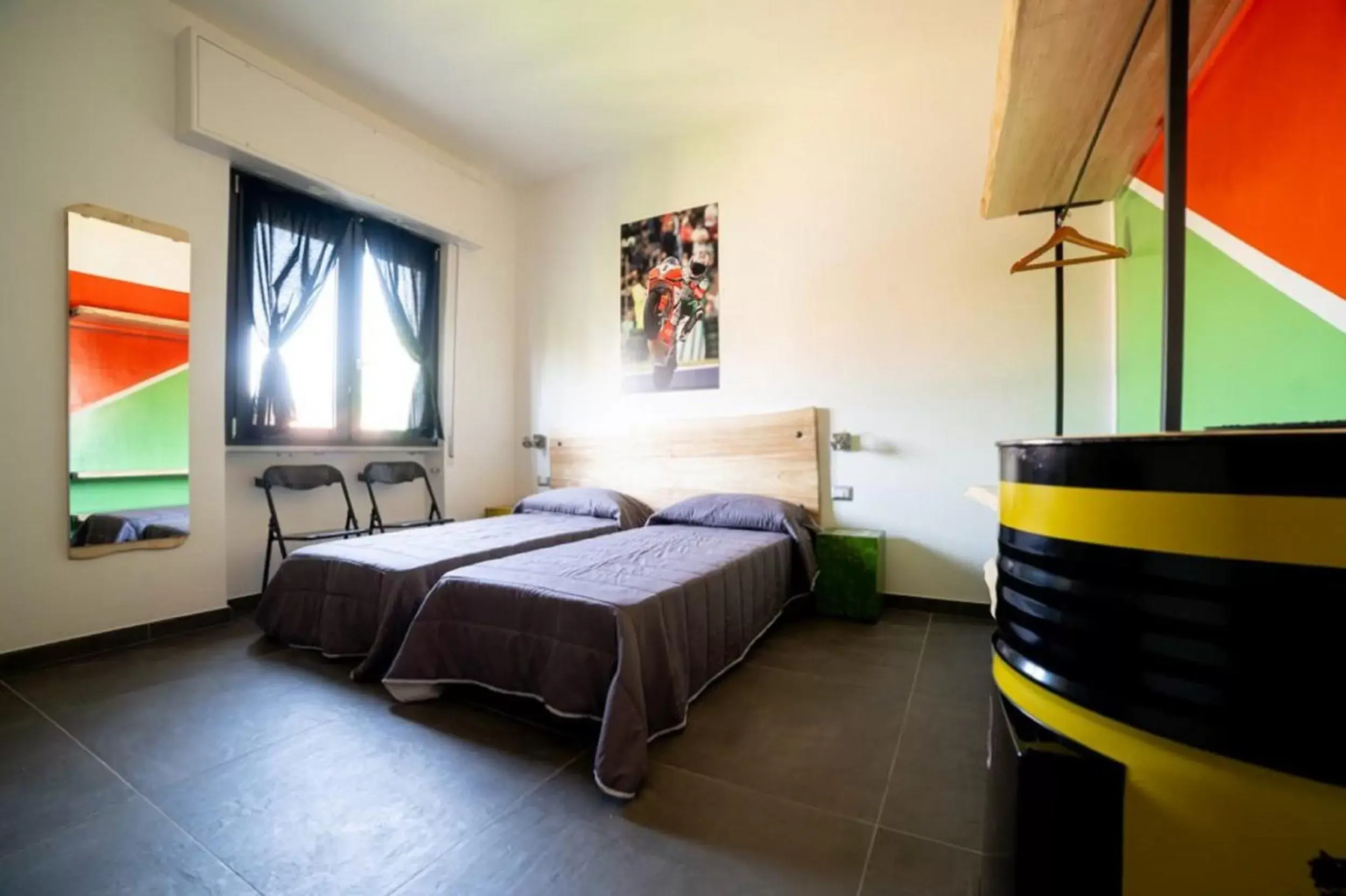 Photo of the whole room, Bed in Italian Piston House Sport Moto Rent