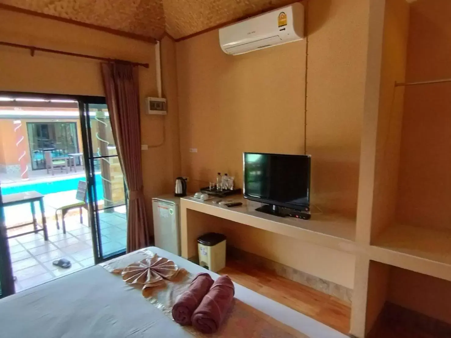 TV and multimedia, Bed in Panisara Pool Villa Resort Huahin TV and multimedia, Bed in Panisara Pool Villa Resort Huahin