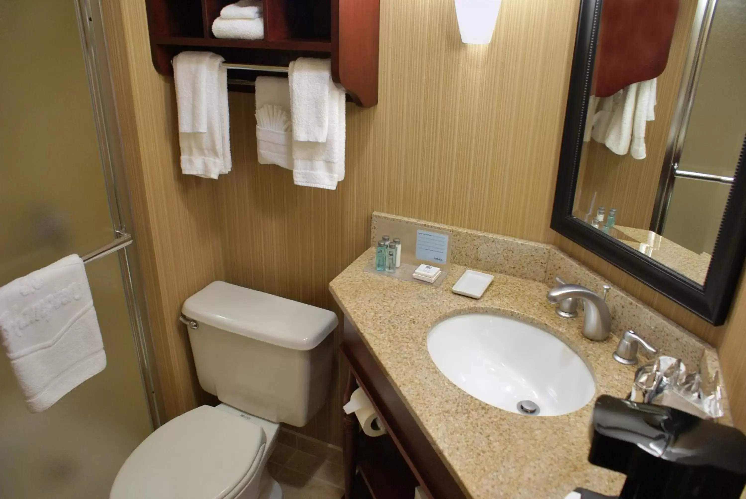 Bathroom in The Addison Hotel SureStay Collection by Best Western