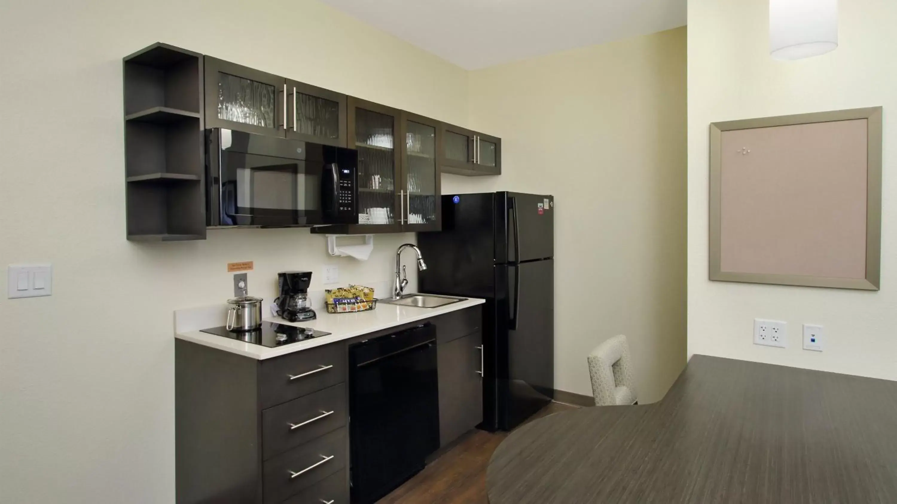 Photo of the whole room, Kitchen/Kitchenette in Candlewood Suites - Frisco, an IHG Hotel