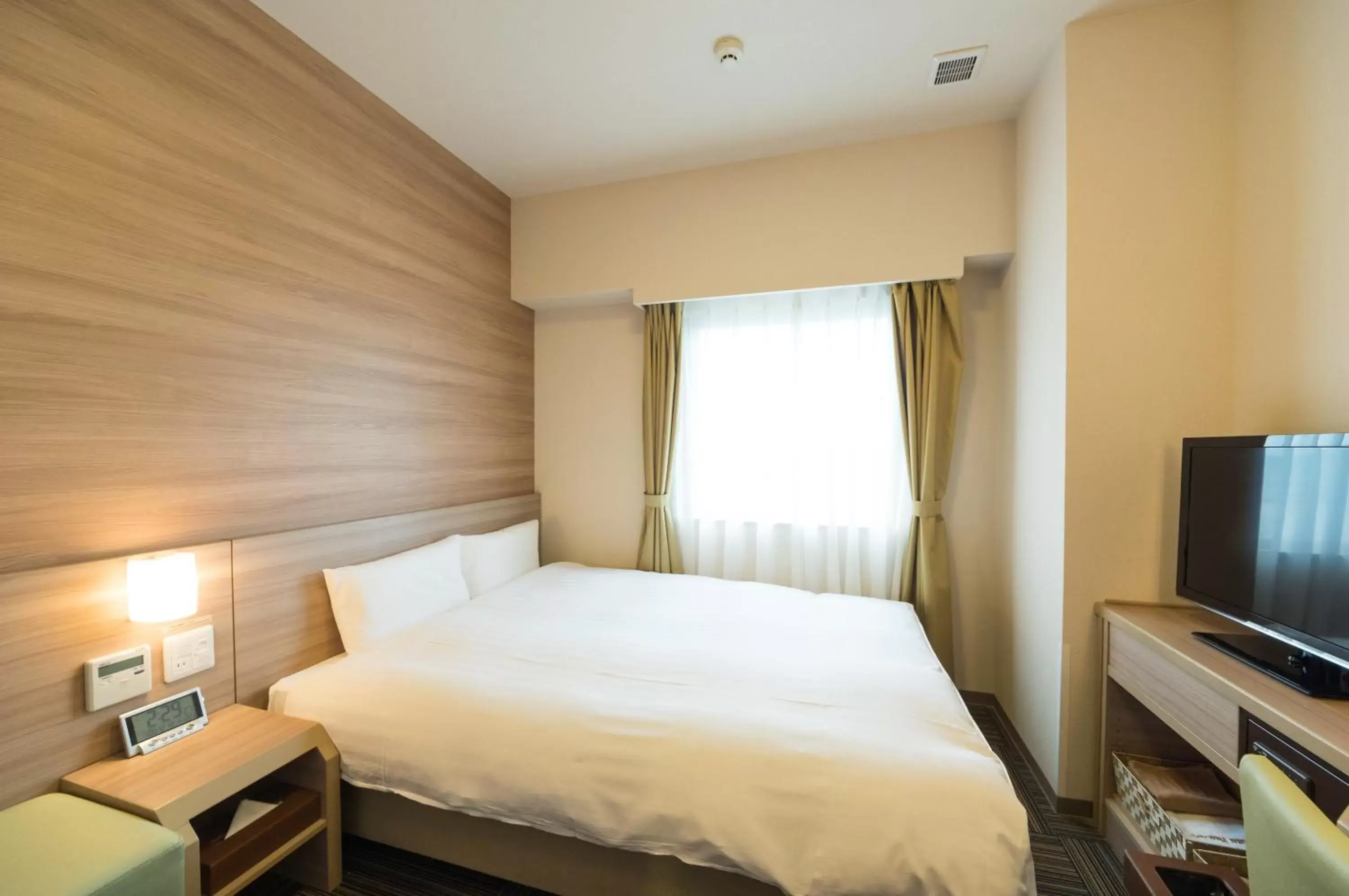 Bed in Dormy Inn Express Kakegawa