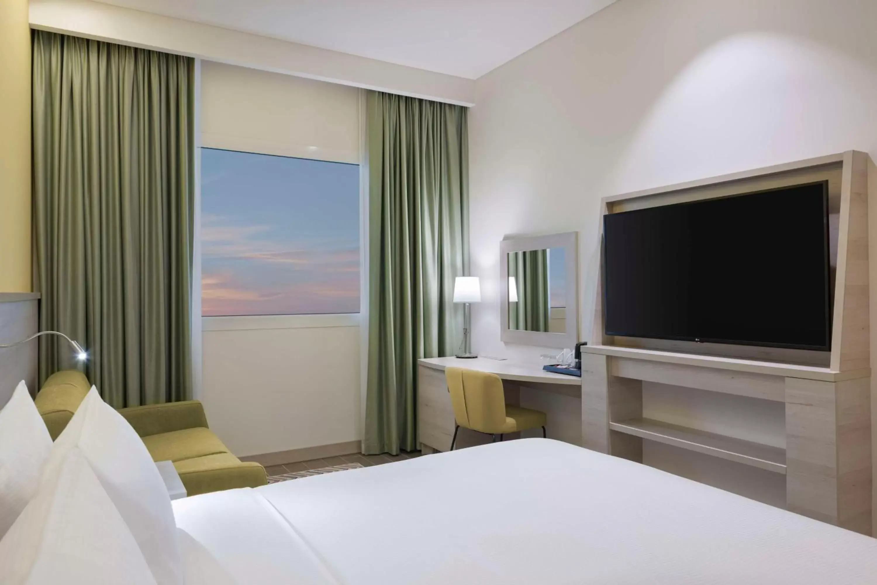 Bed, TV/Entertainment Center in Hampton By Hilton Doha Old Town