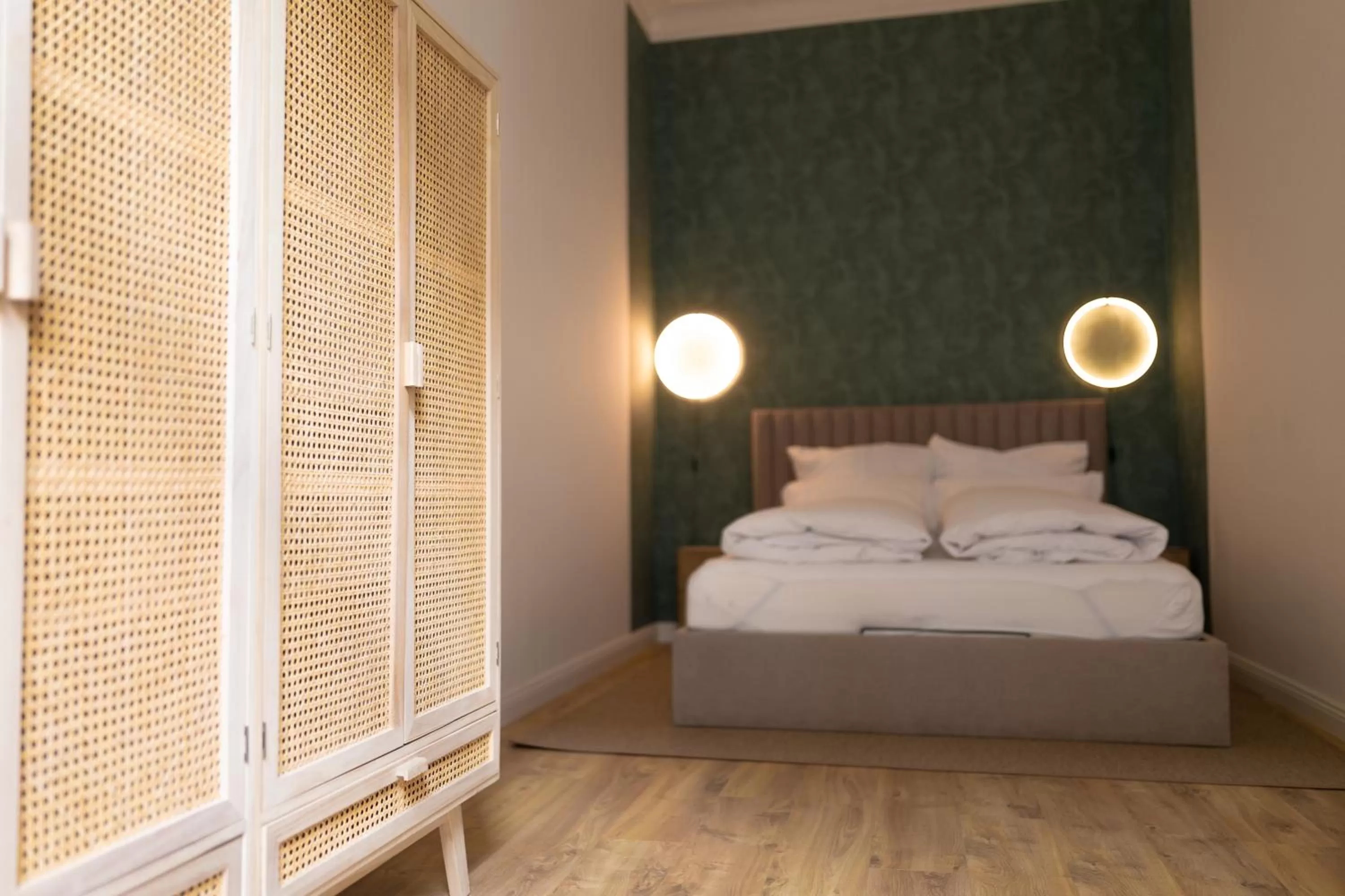 Bed in The Weinert Suites