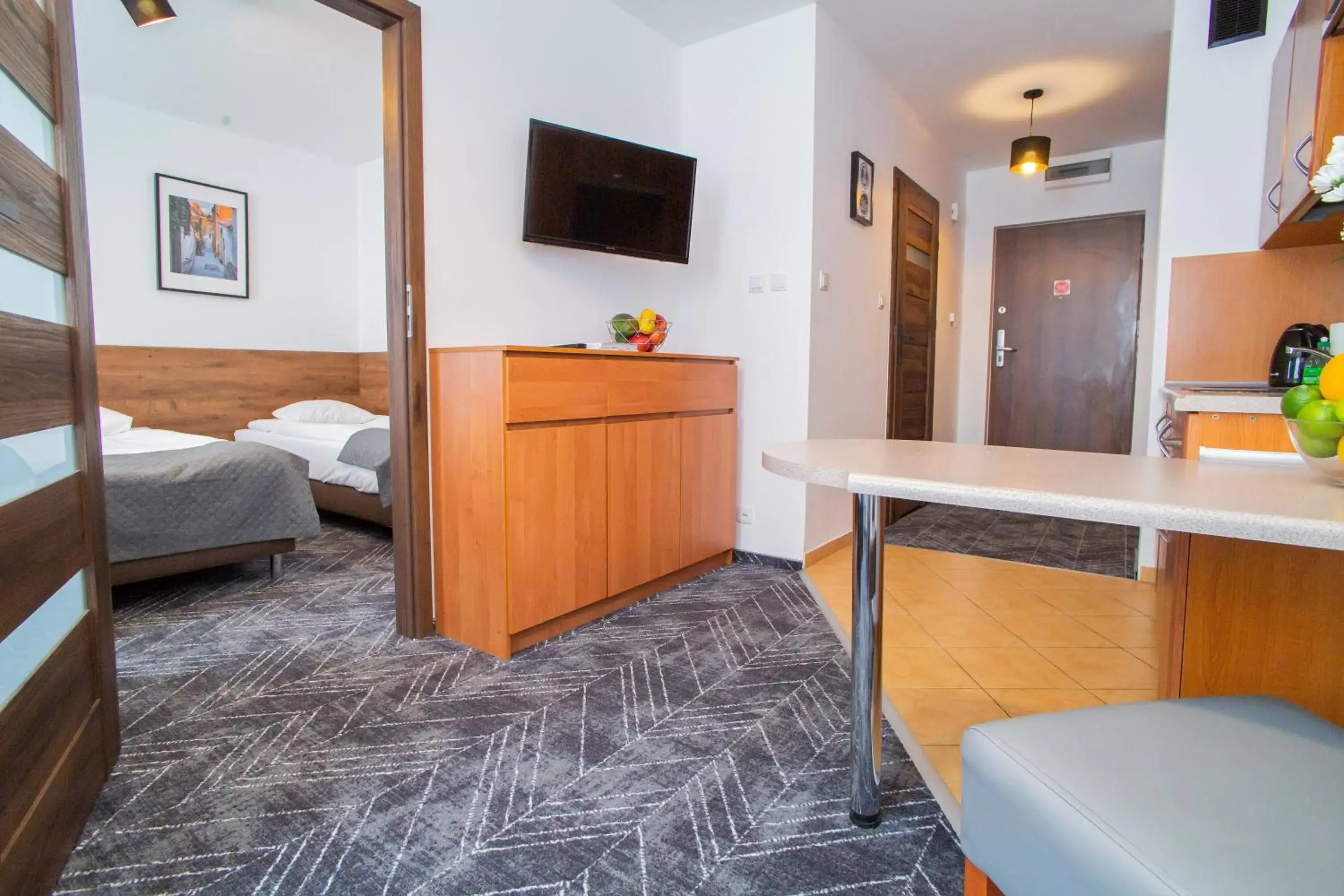 Living room, Bed in Warsaw Apartments - Apartamenty Wilanów Living room, Bed in Warsaw Apartments - Apartamenty Wilanów