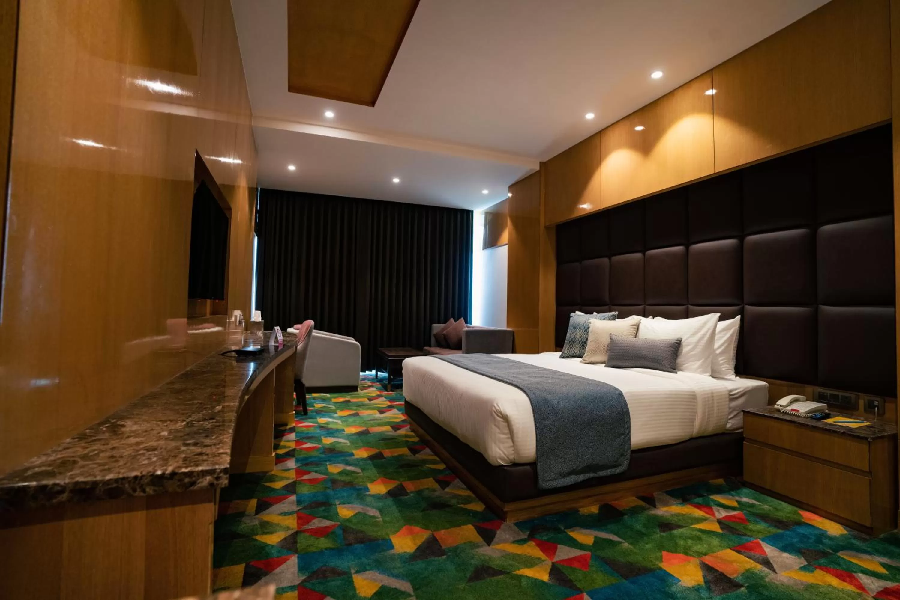 Photo of the whole room, Bed in Ramada Plaza by Wyndham Jammu Vijaypur