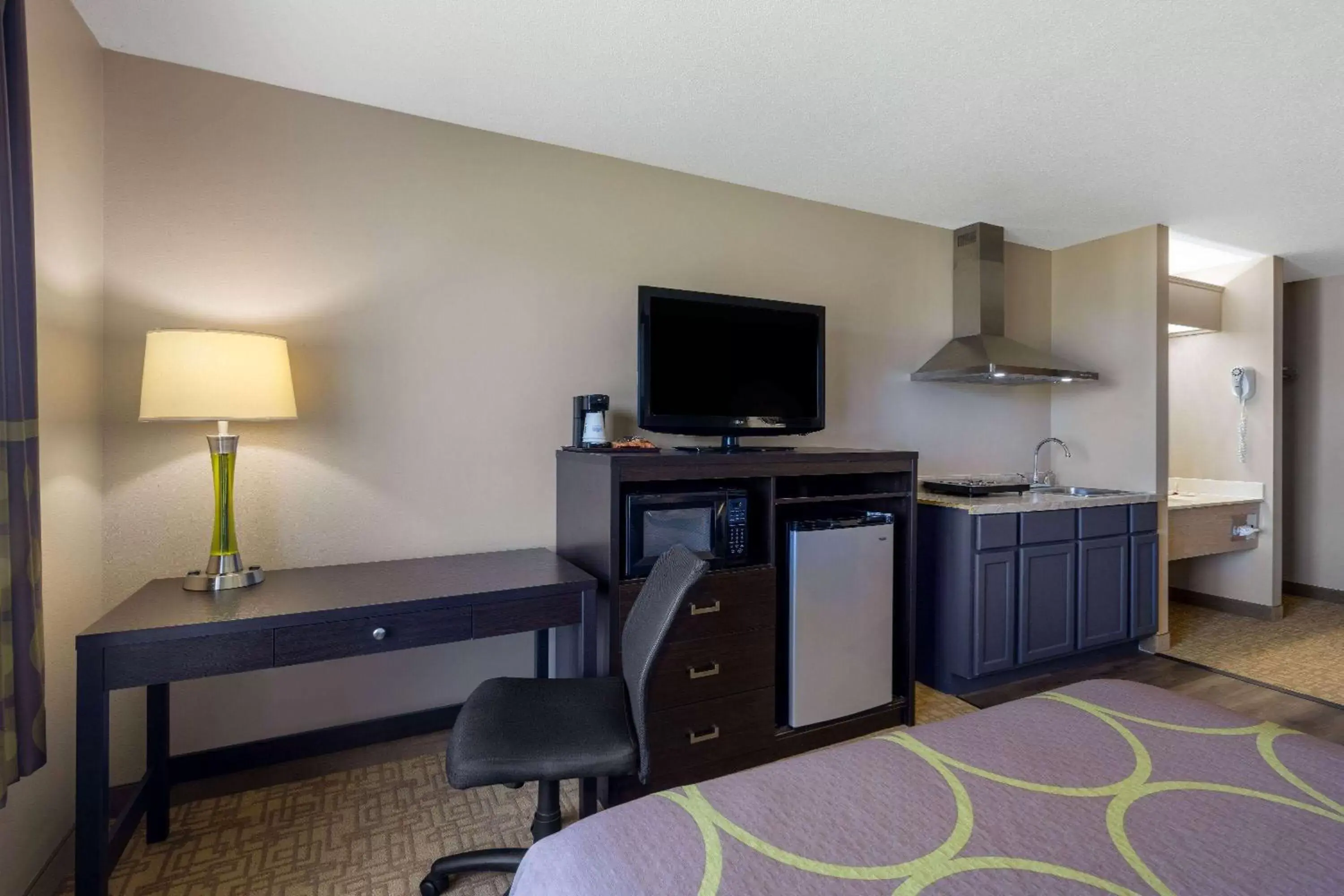 Photo of the whole room, TV/Entertainment Center in Super 8 by Wyndham Jackson MN