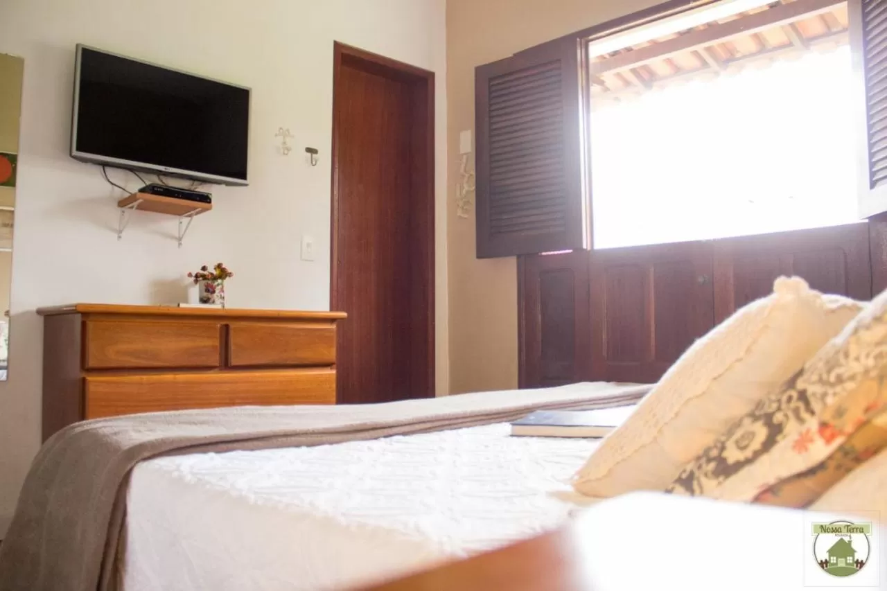Bed in Pousada Nossa Terra