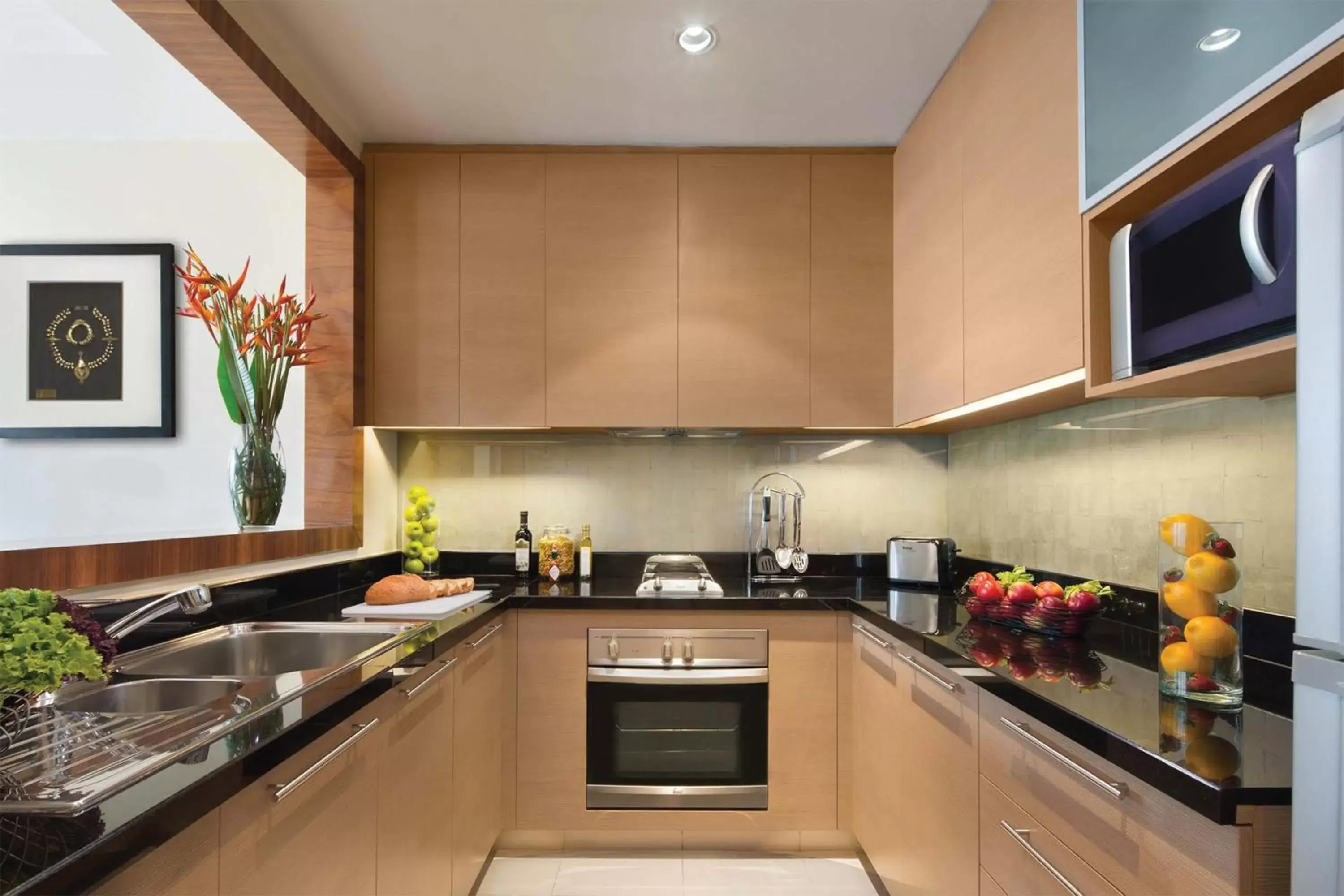 Kitchen or kitchenette, Kitchen/Kitchenette in Oakwood Premier Cozmo Jakarta