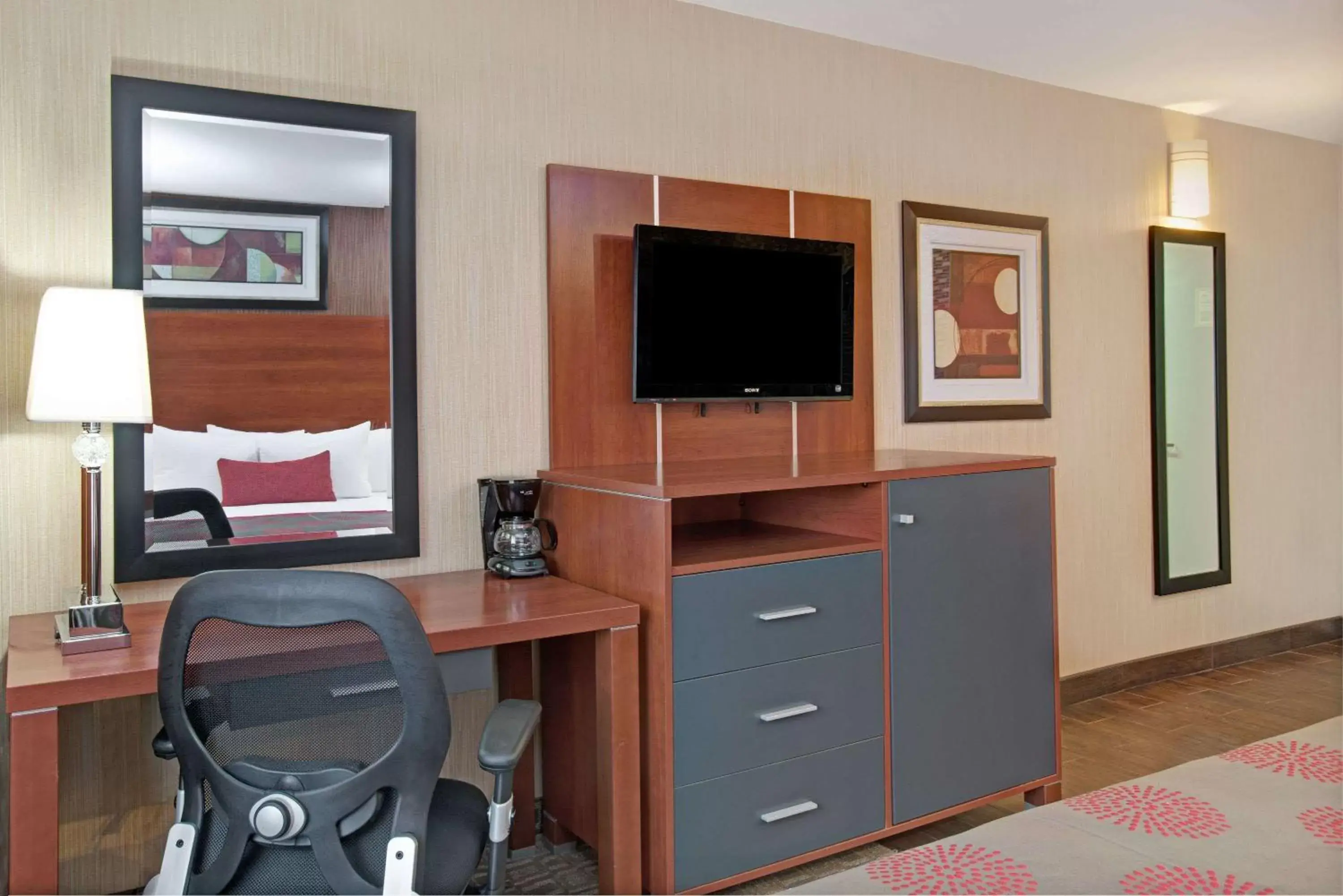 Photo of the whole room, TV/Entertainment Center in Ramada by Wyndham Staten Island