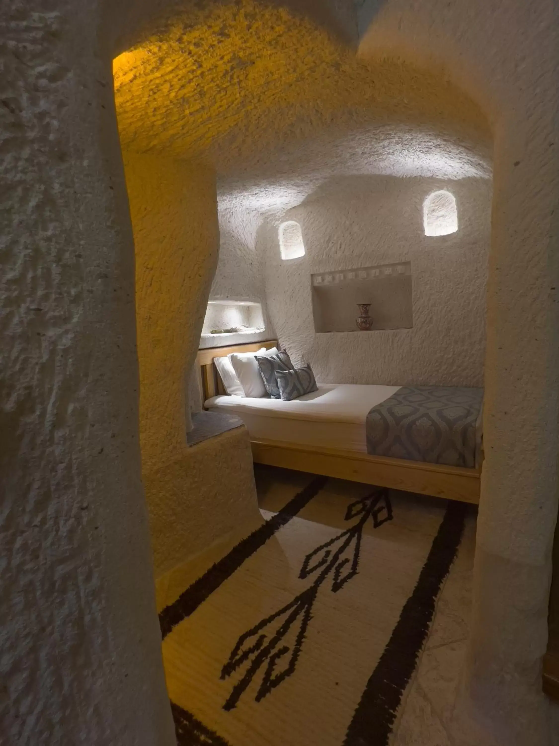 Bed in Local Cave House Hotel