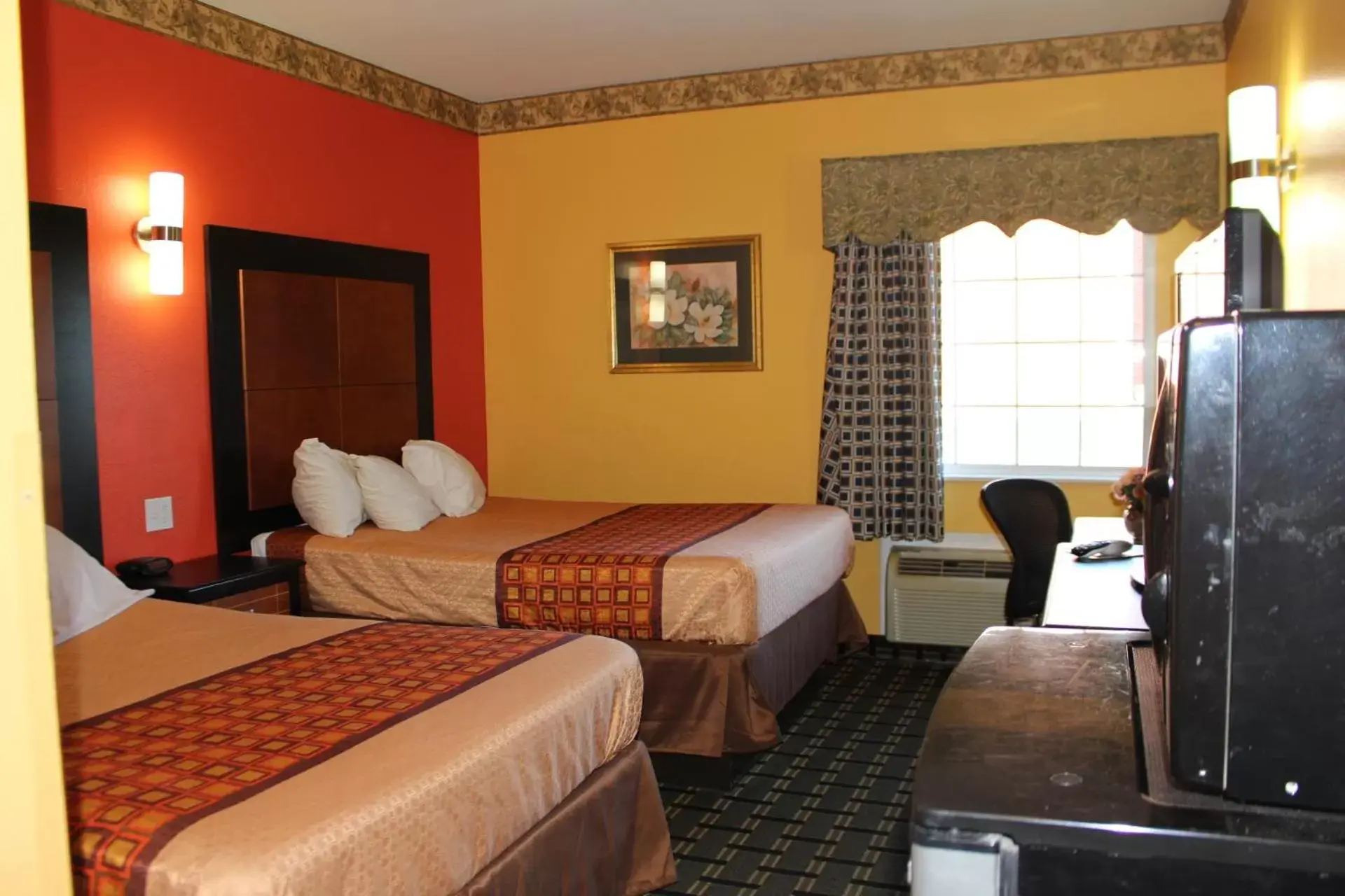 Bedroom, Bed in Magnolia Inn And Suites