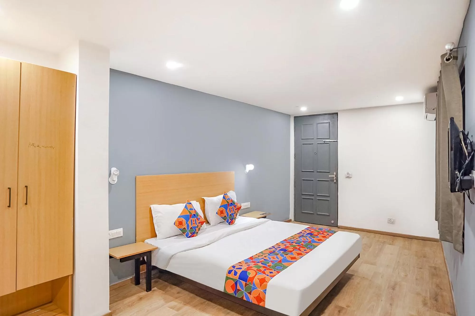 Communal lounge/ TV room, Bed in FabHotel F9 Sector 121